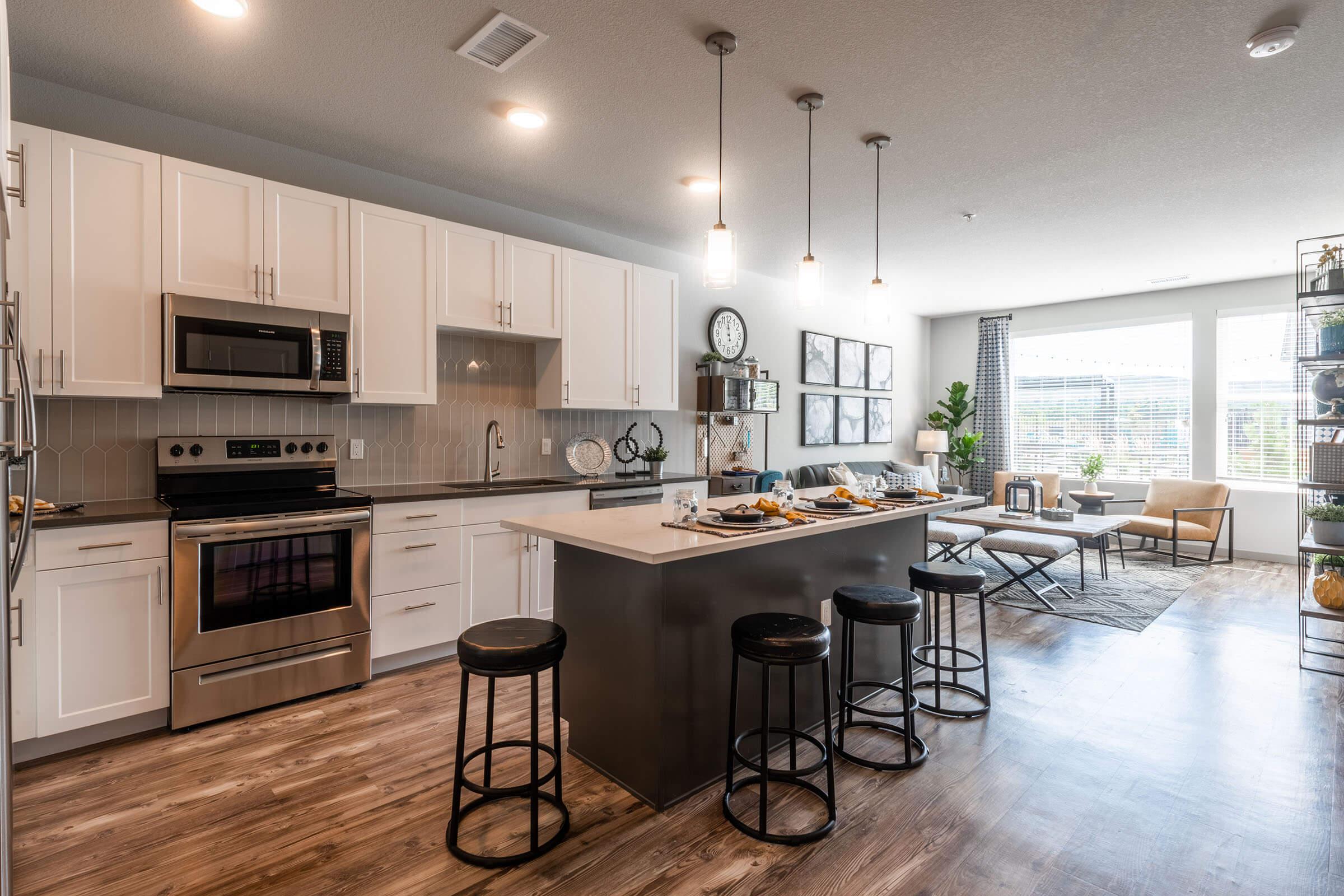 a kitchen with a dining room table