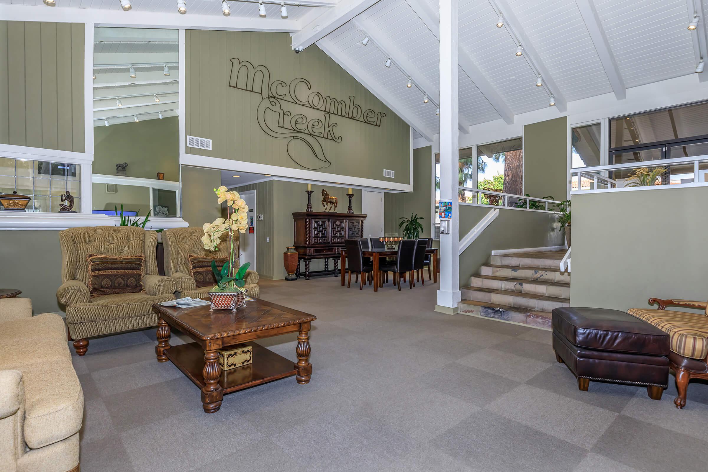 a living room filled with lots of furniture