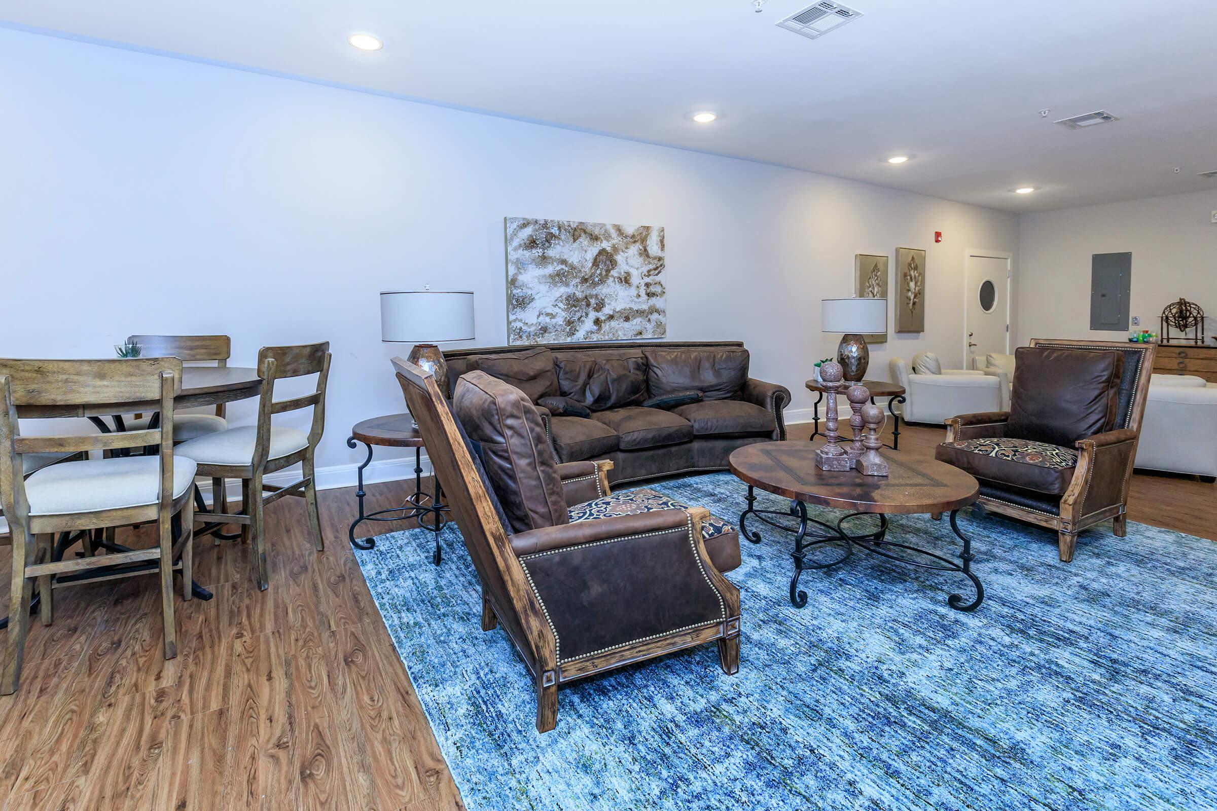 a living room with a wooden floor