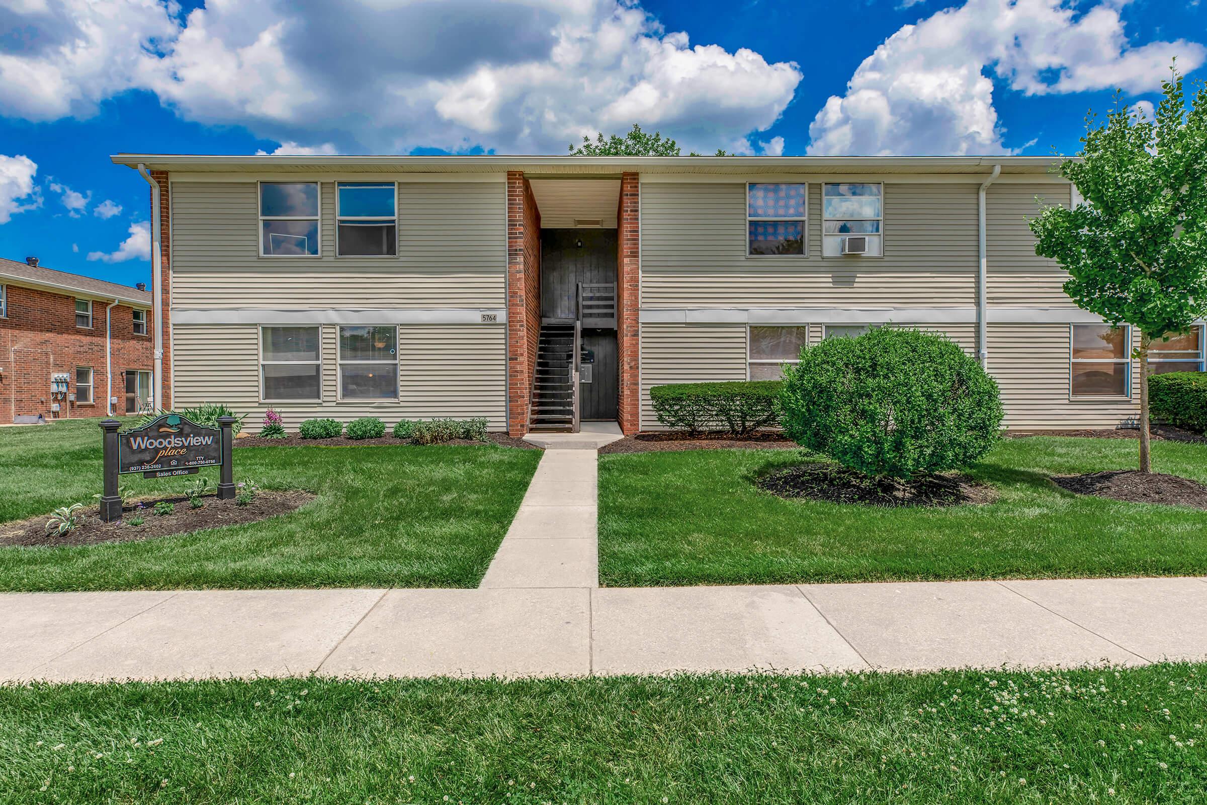 a large lawn in front of a house