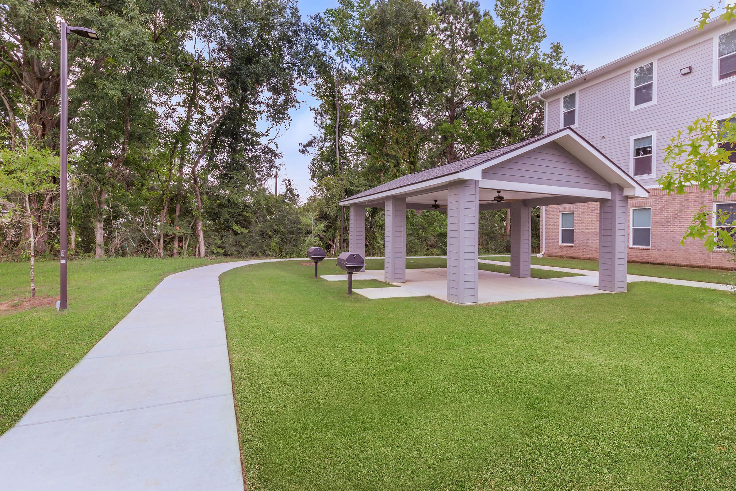 a large lawn in front of a house