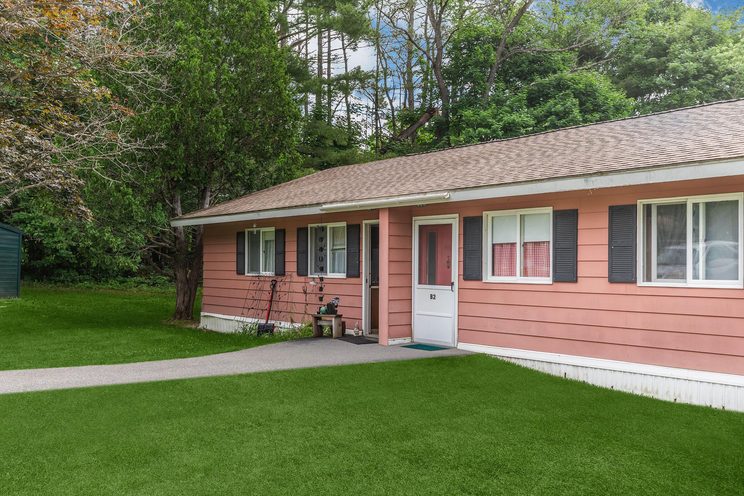 a large lawn in front of a house