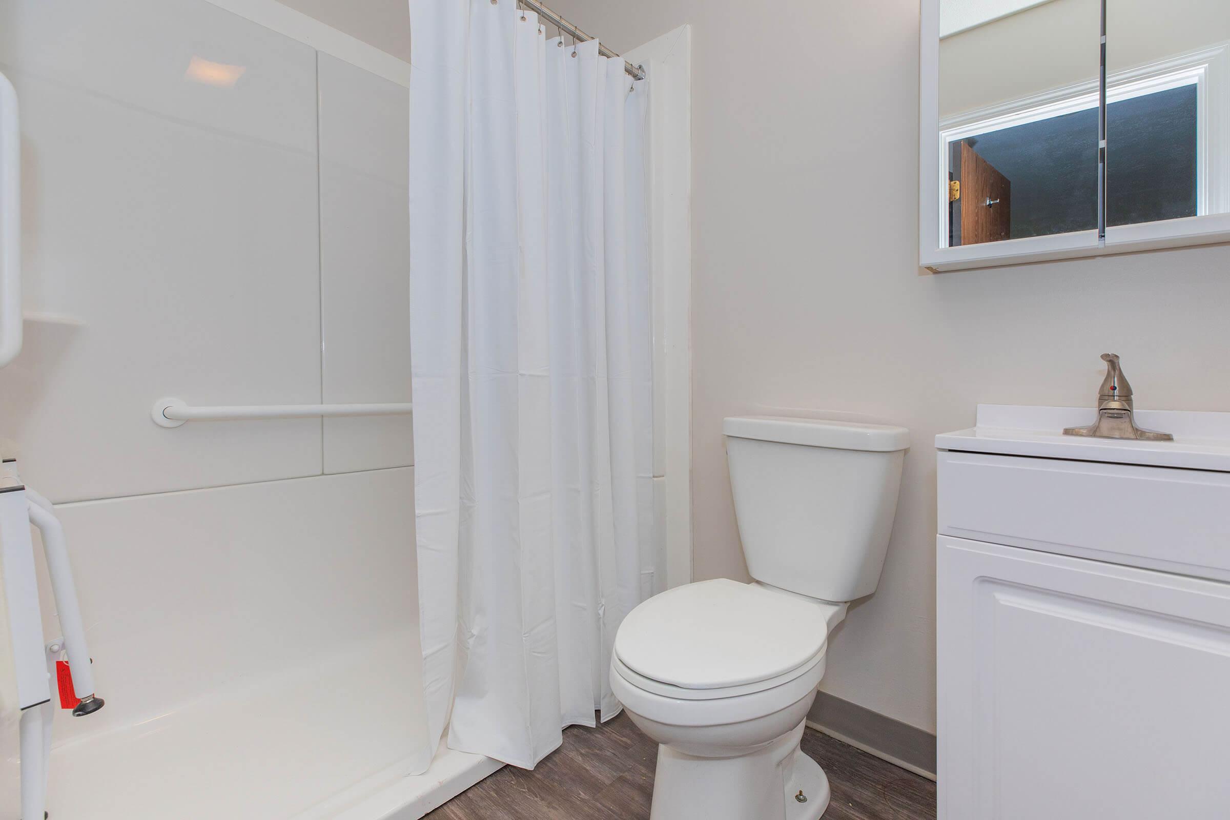 a close up of a shower in a small room