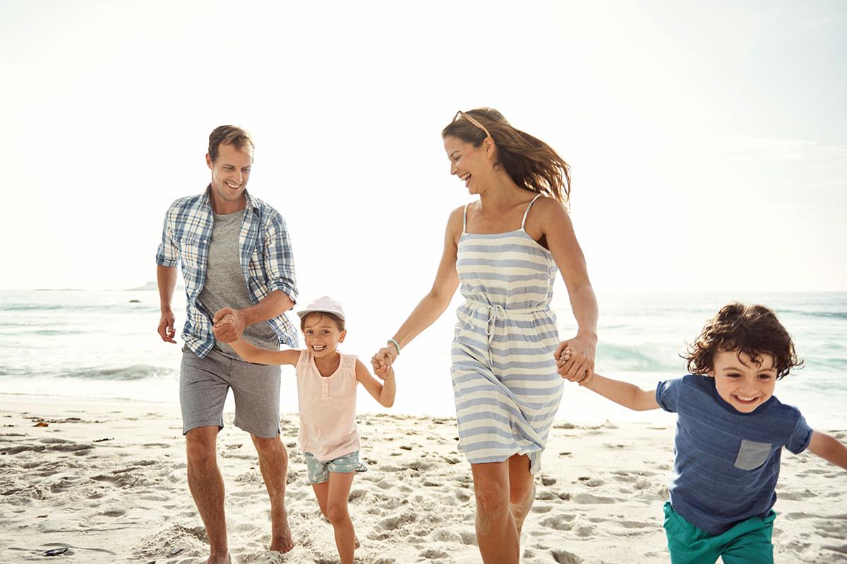 a group of people on a beach