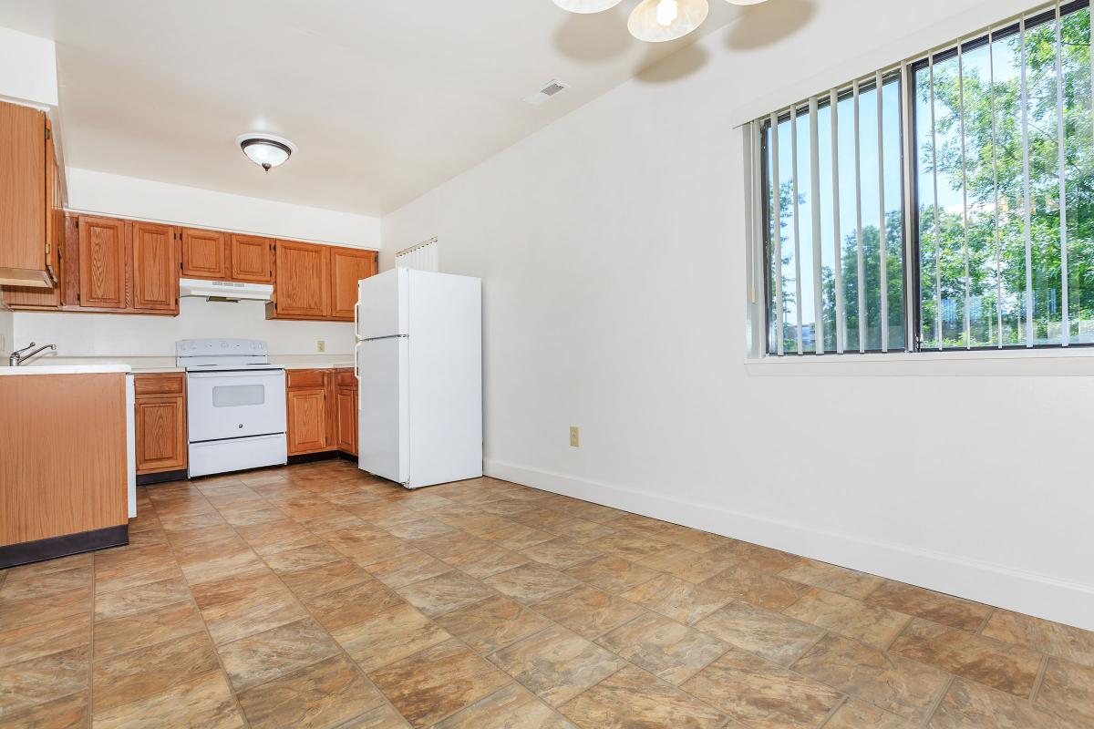 a kitchen with a wood floor