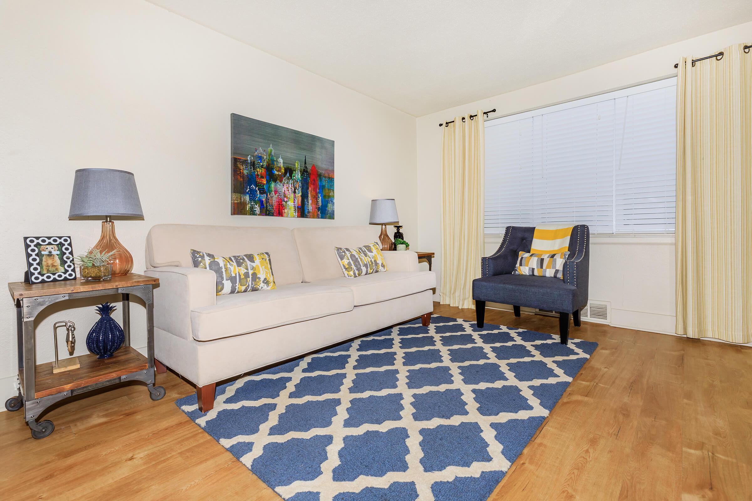 a living room with a wood floor
