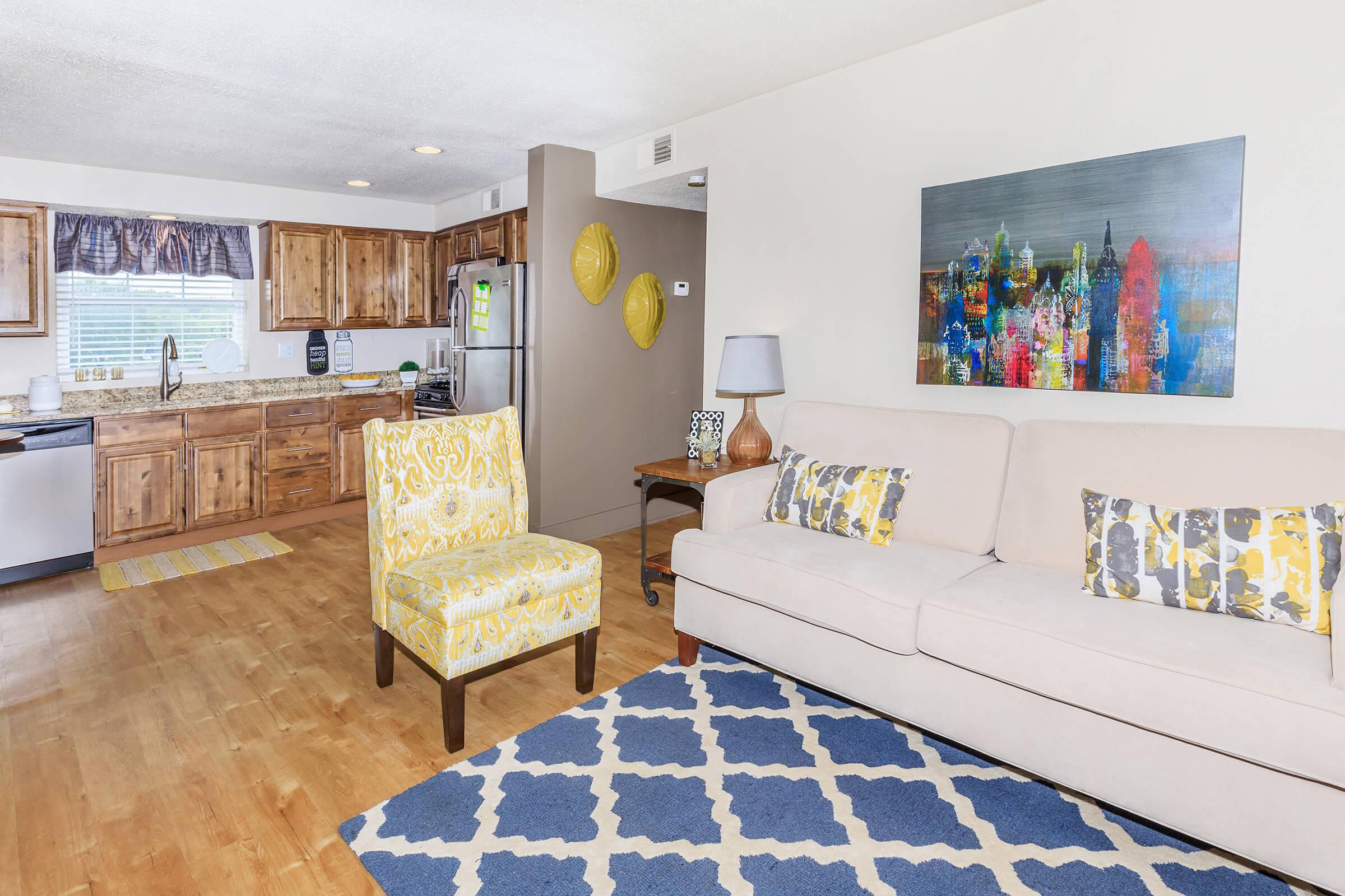a bedroom with a wooden floor