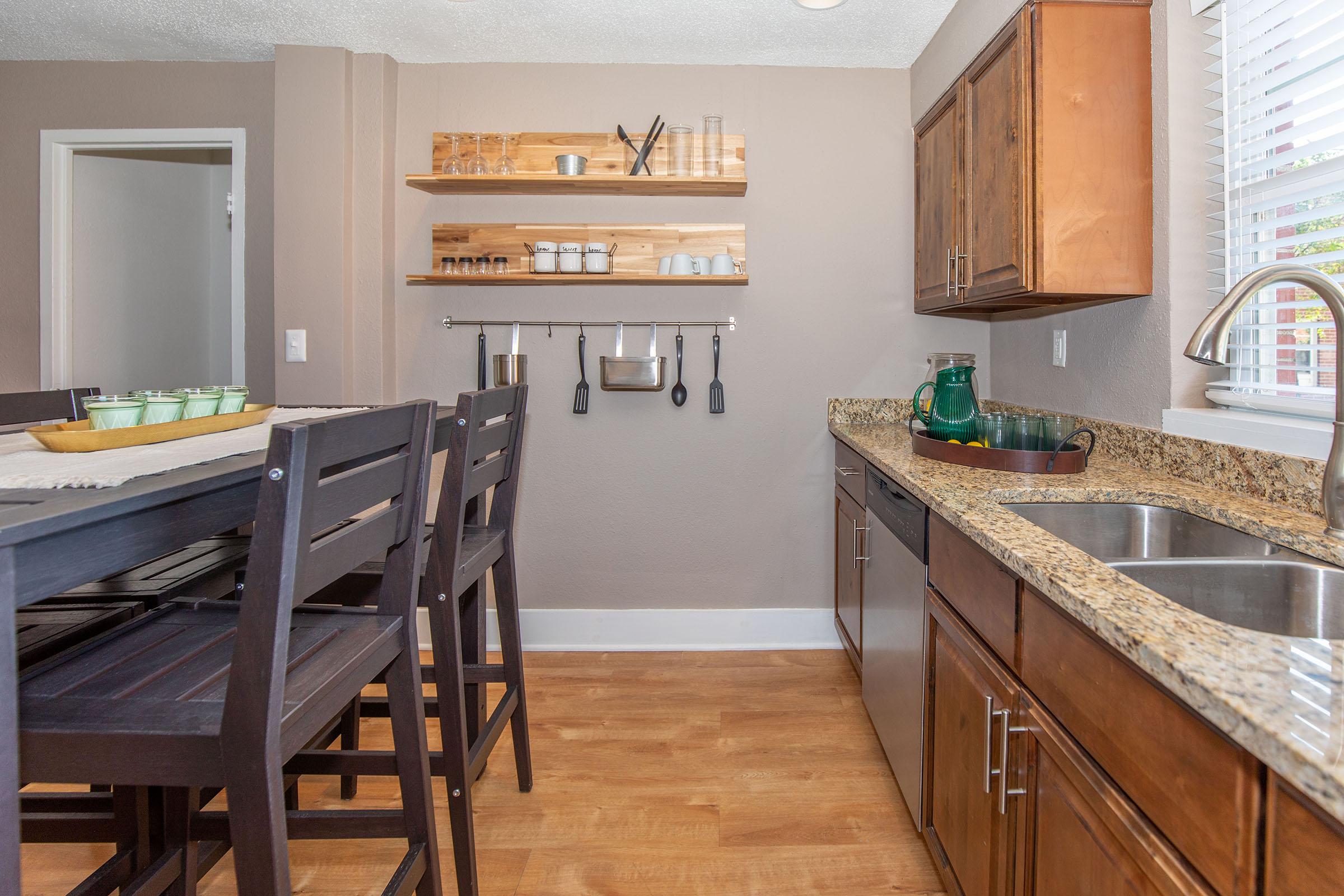 a kitchen with a wooden counter