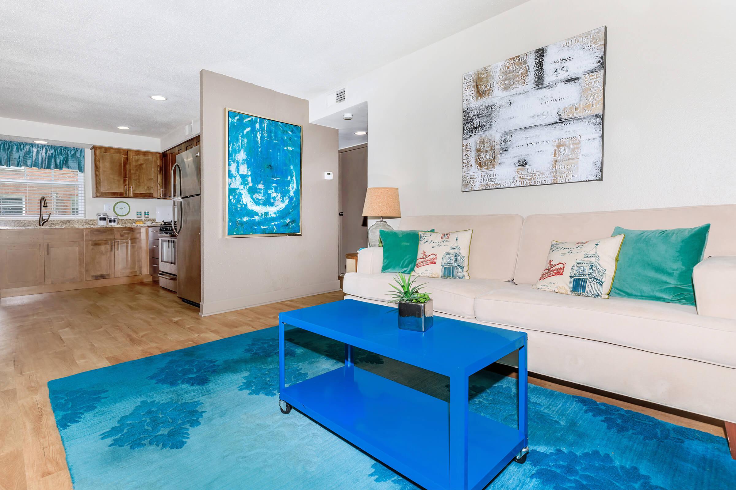 a living room with blue walls