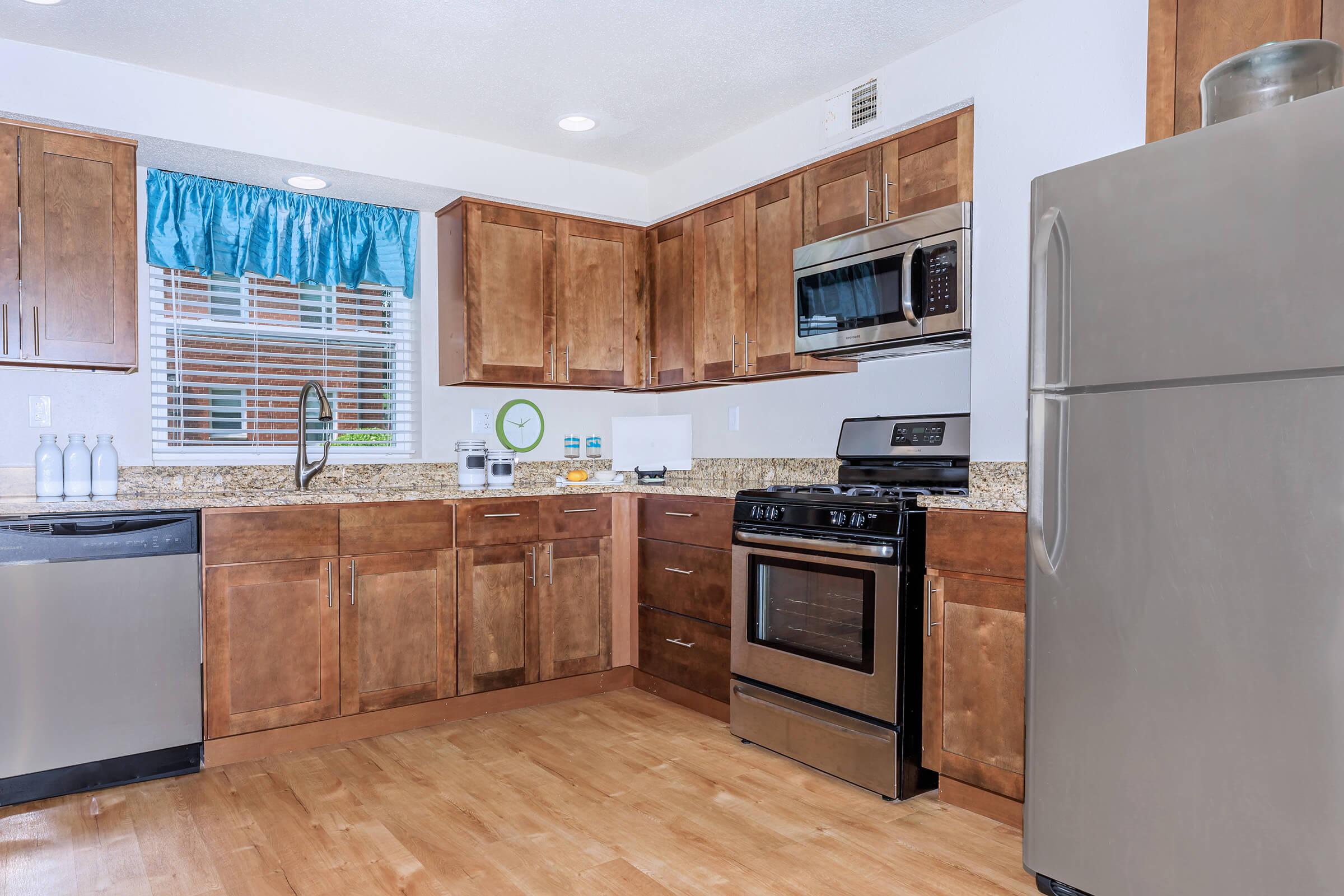 a stainless steel refrigerator in a kitchen
