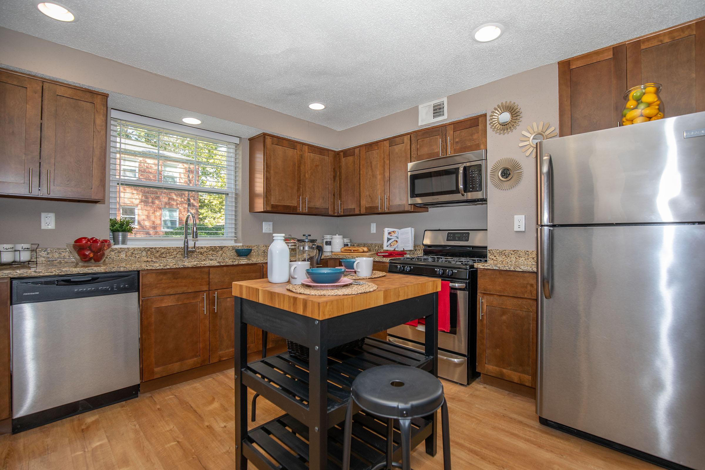 a modern kitchen with stainless steel appliances