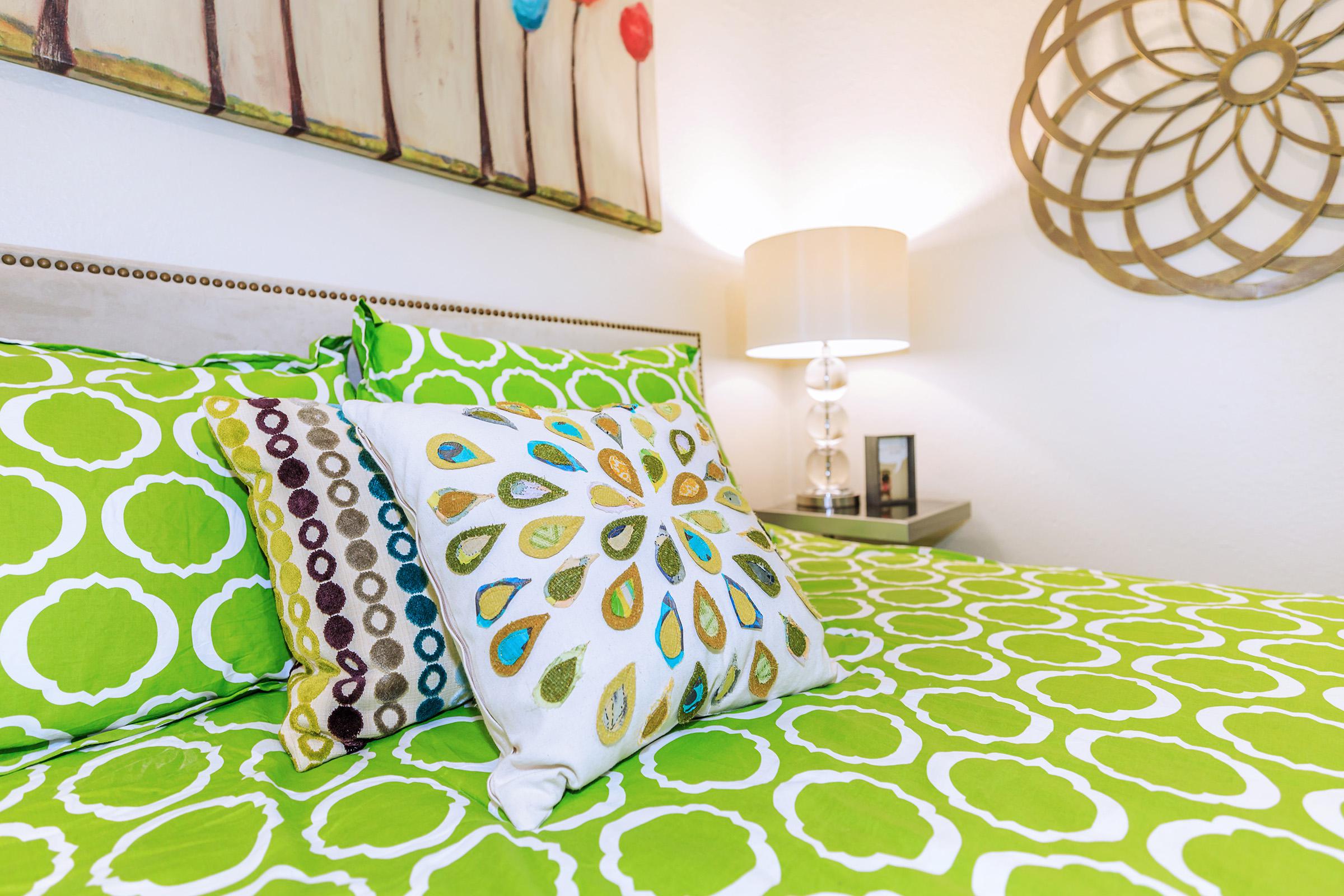 a made bed in a bedroom