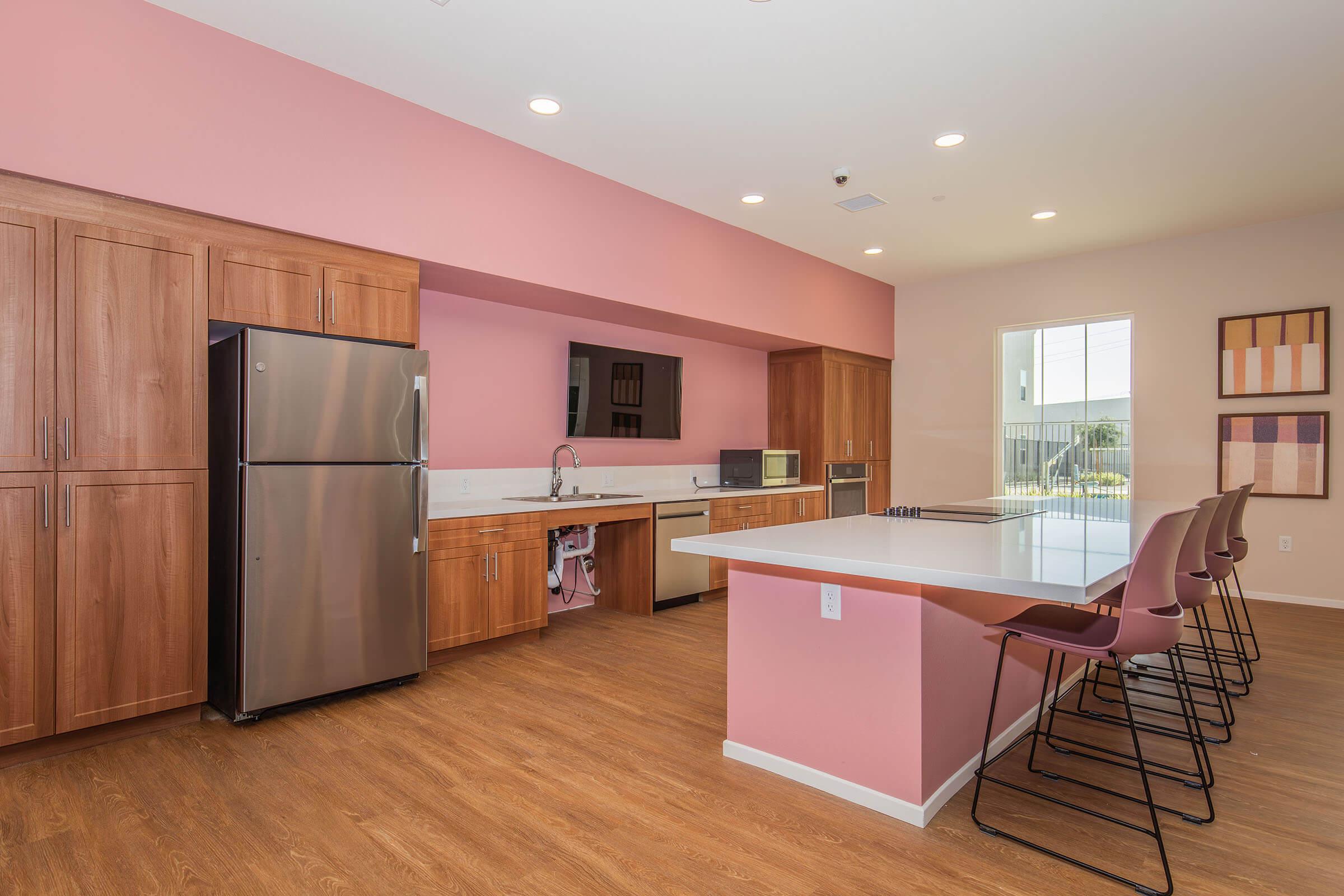 a kitchen with a wooden floor