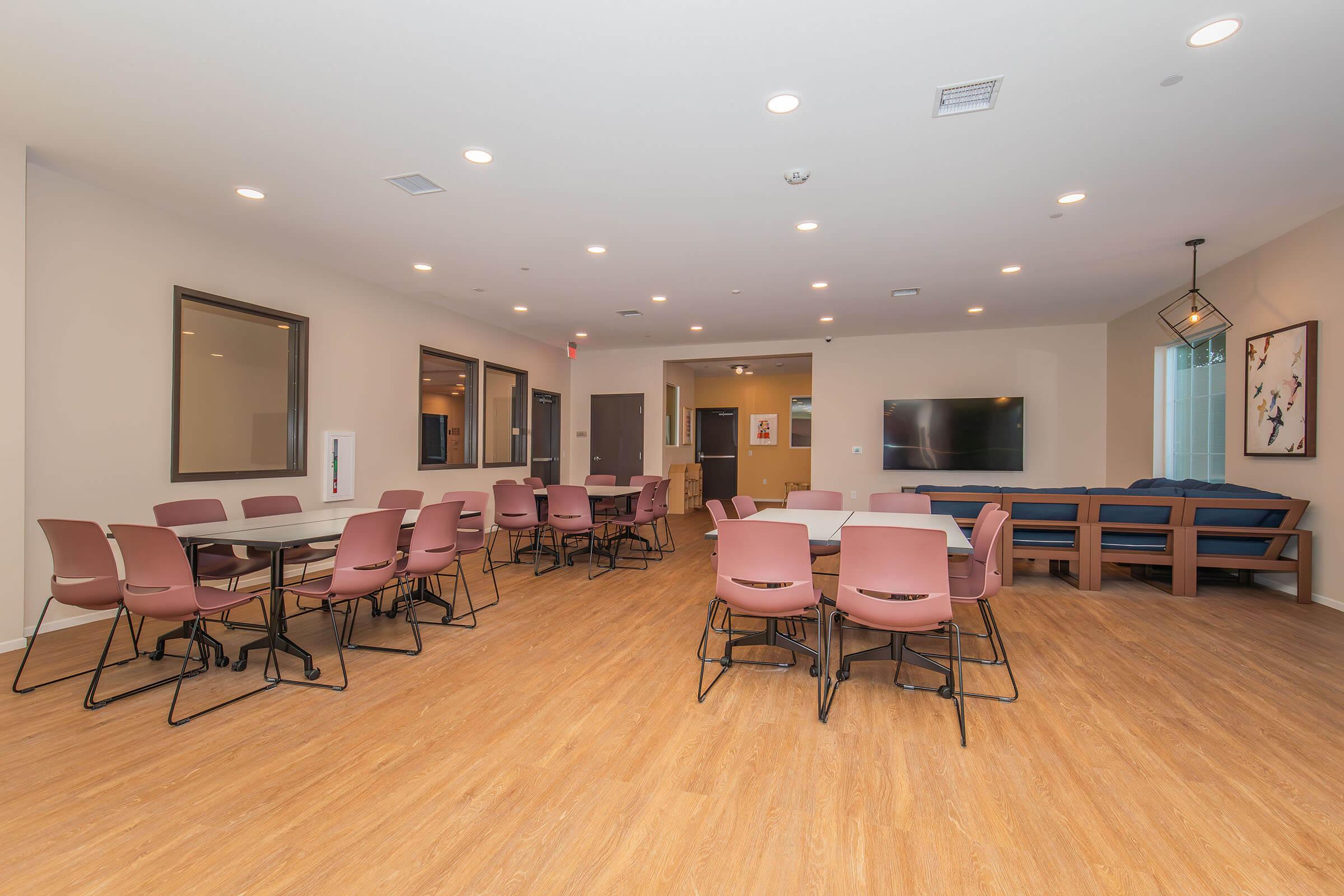 a room filled with furniture and a table