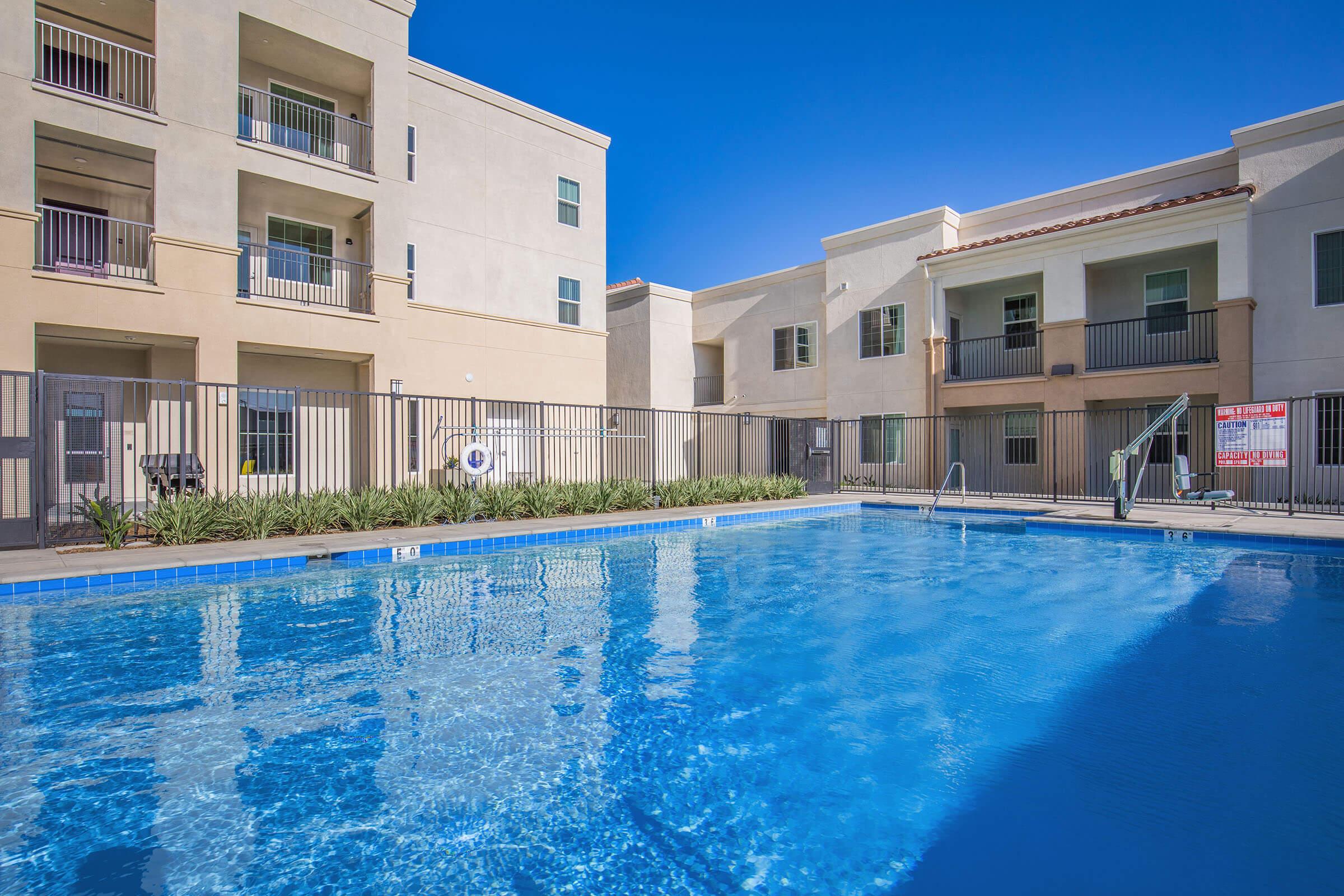 a large pool of water in front of a building