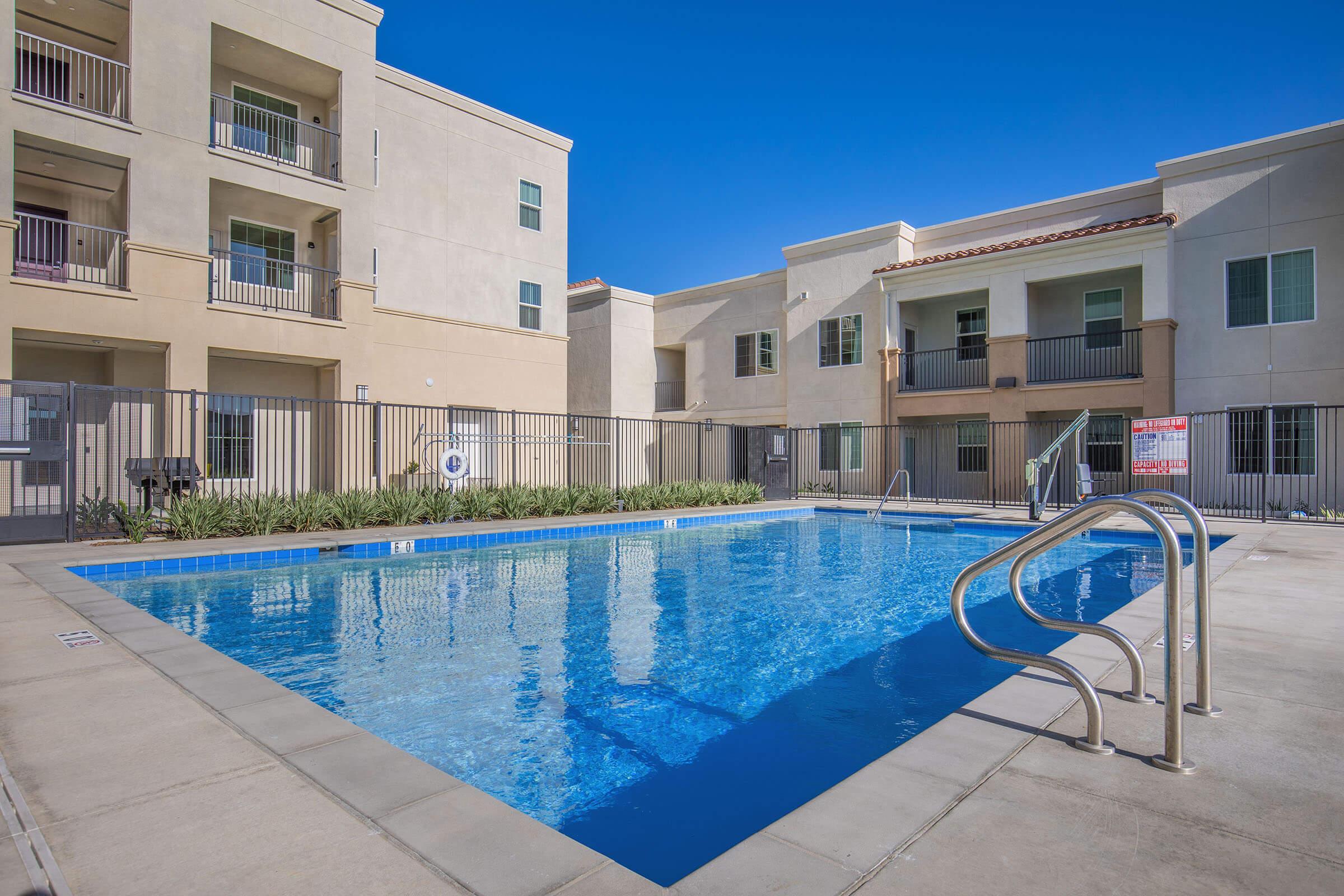 a pool in front of a building