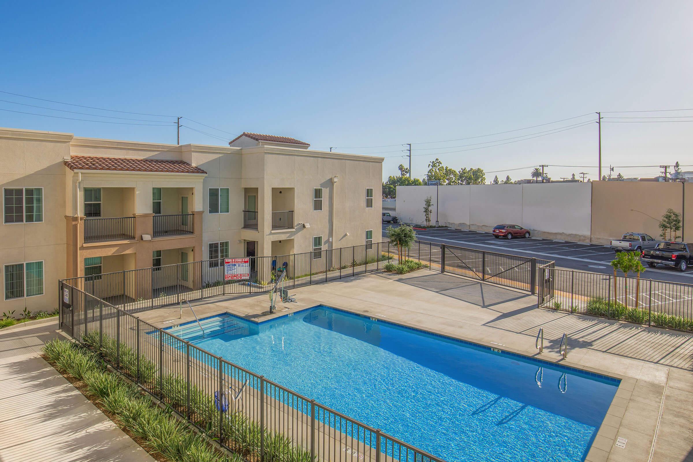 a pool next to a building