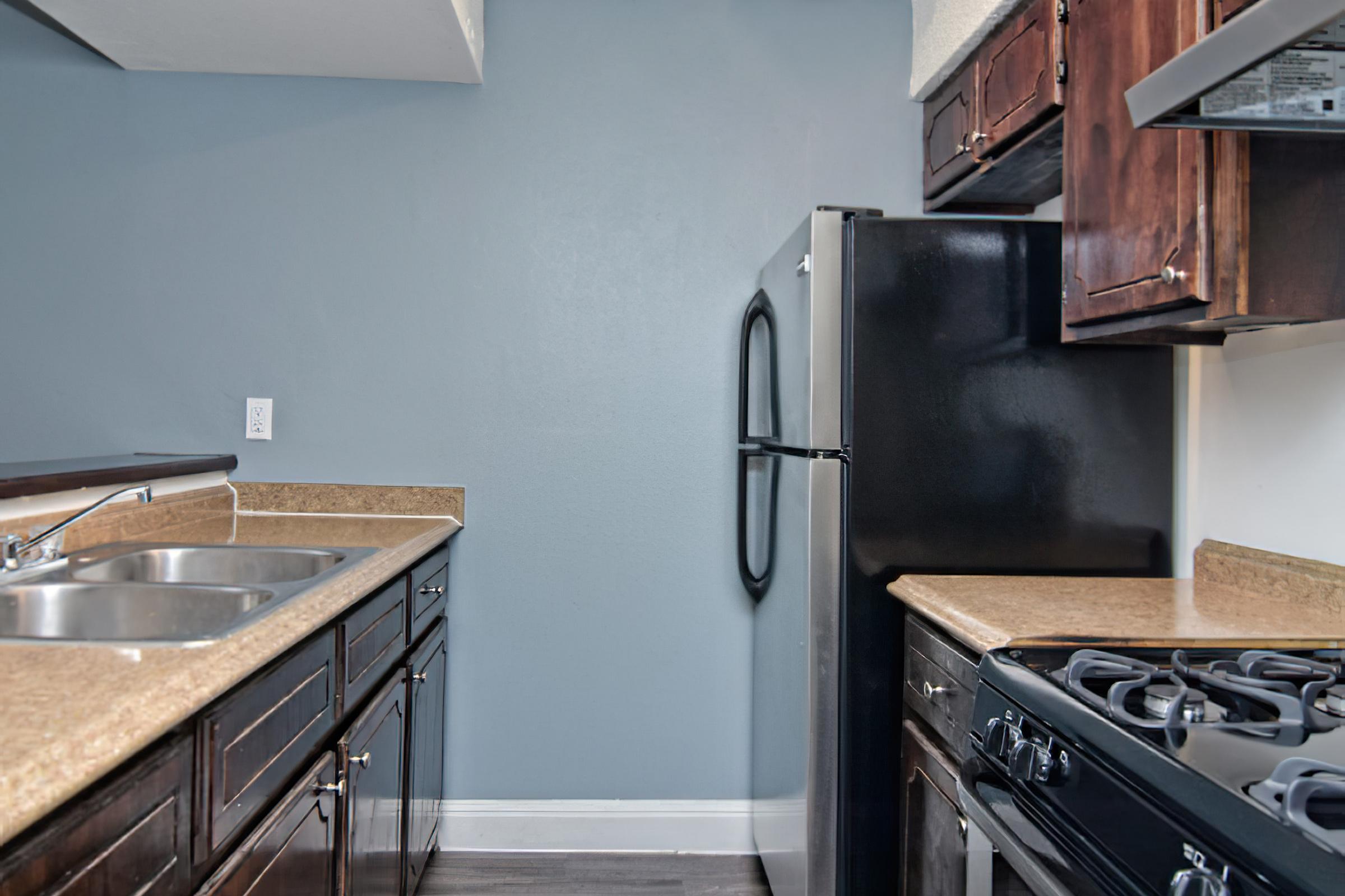 a kitchen with a stove top oven
