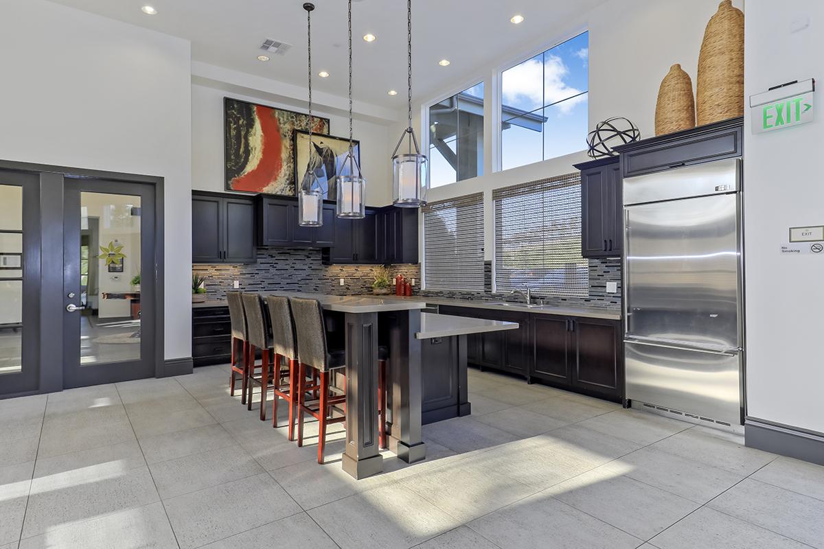 The community kitchen with stainless steel appliances