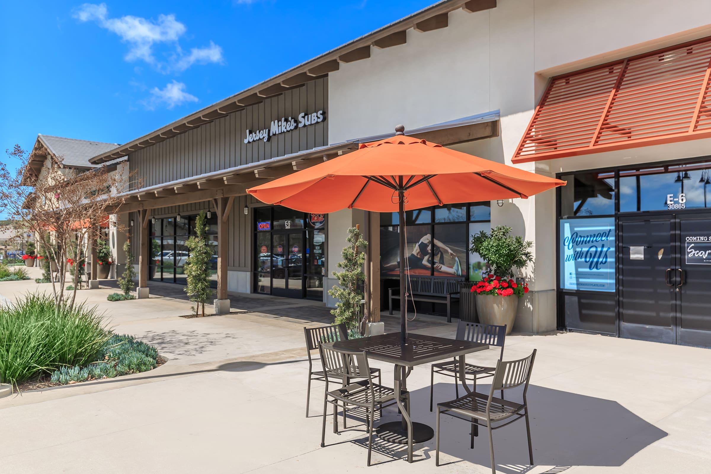 Sendero Marketplace shopping center with table and chairs
