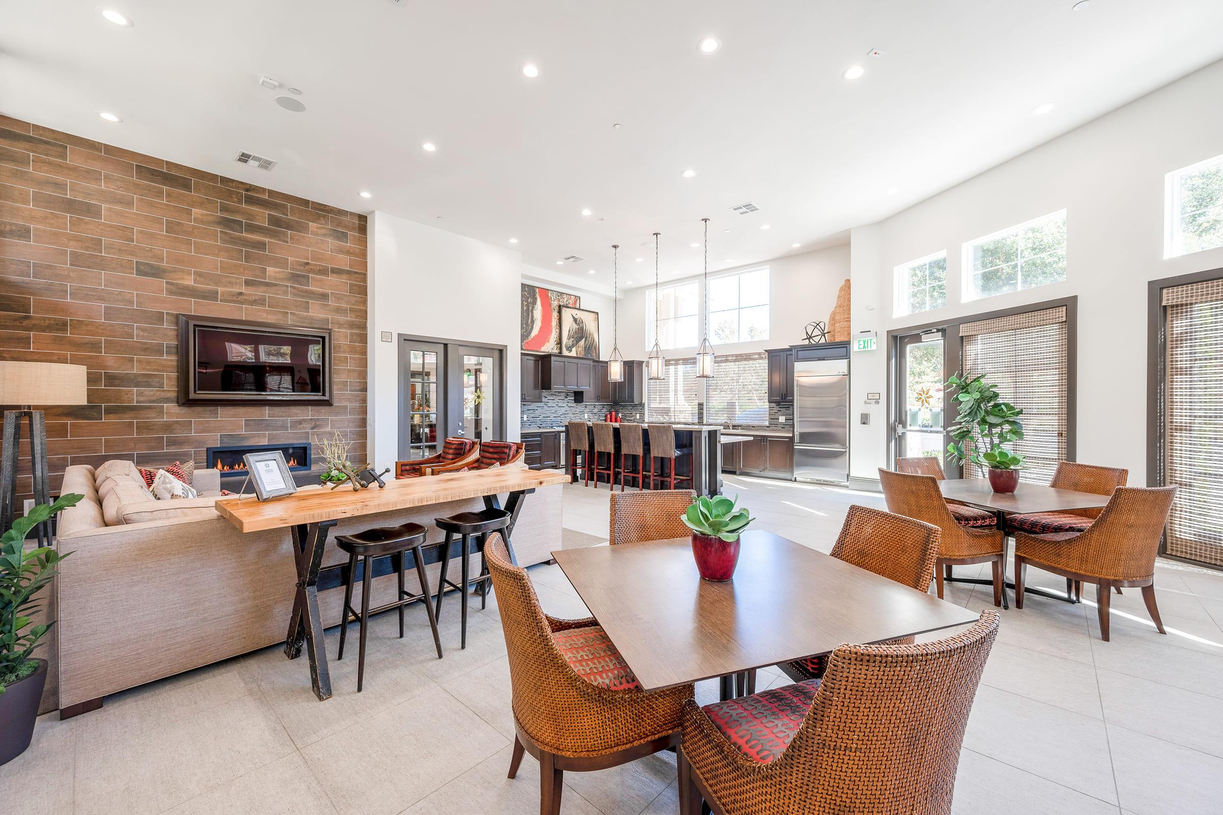 a living room filled with furniture and a large window