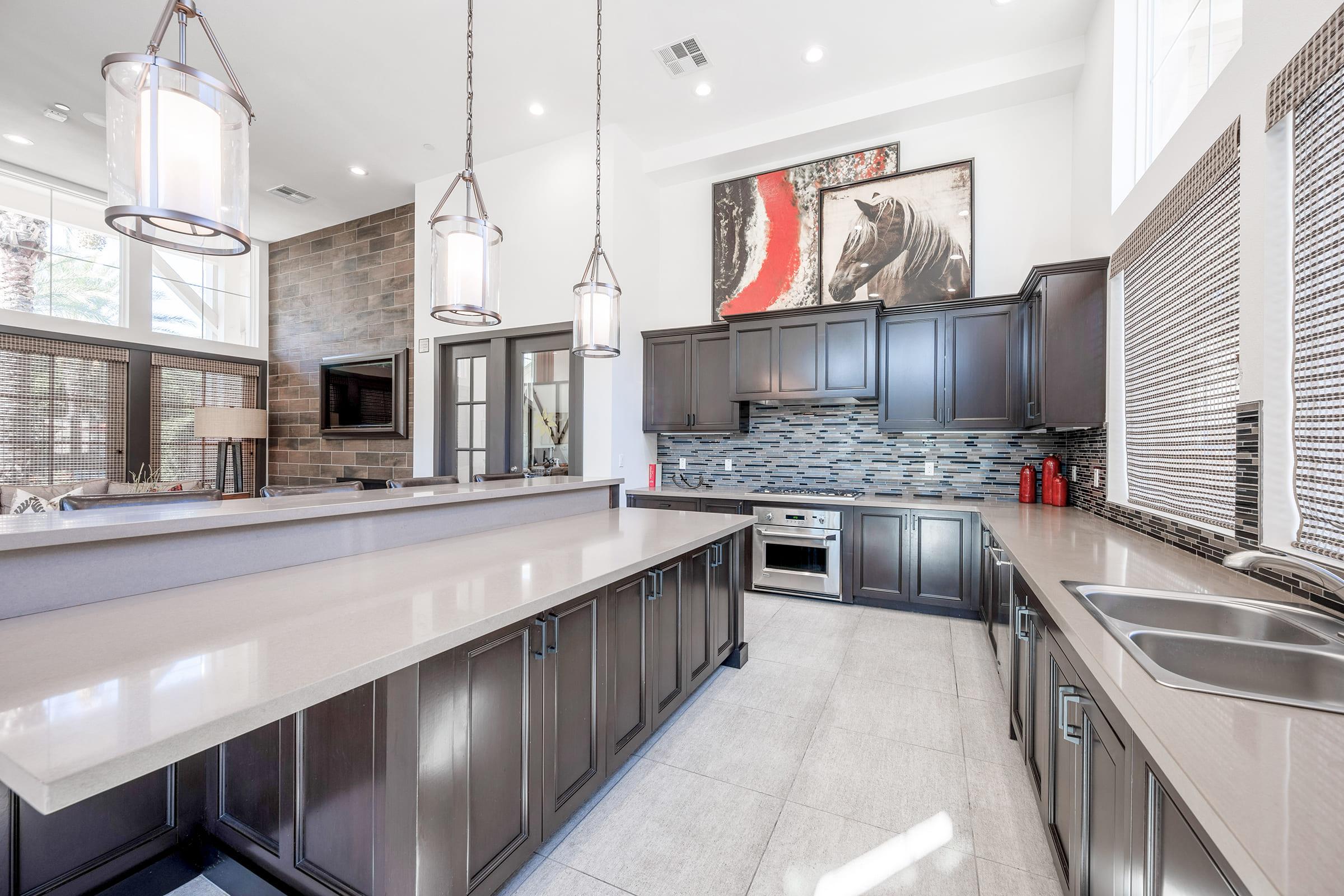 a kitchen with a building in the background