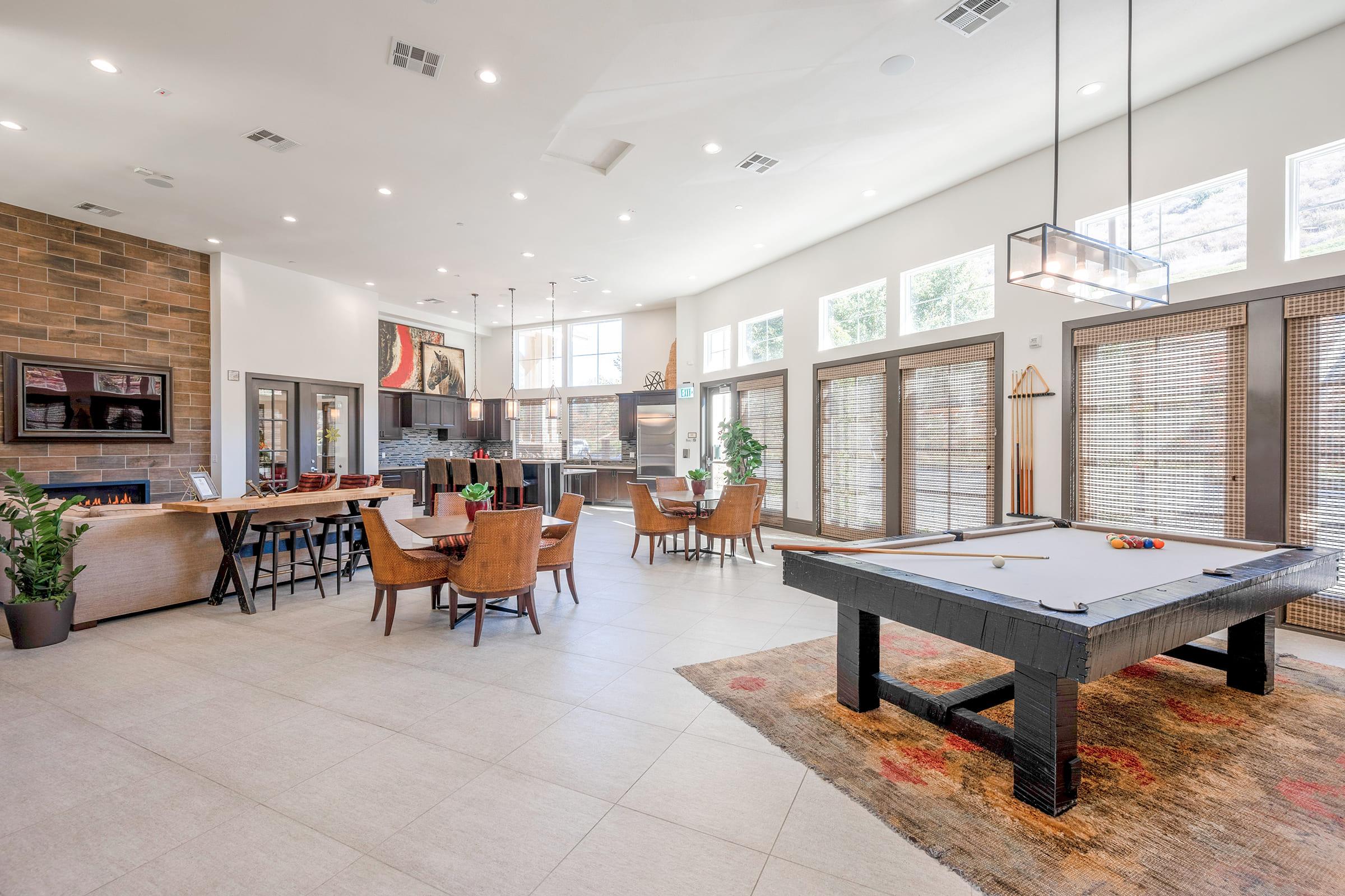 a room filled with furniture and a fireplace