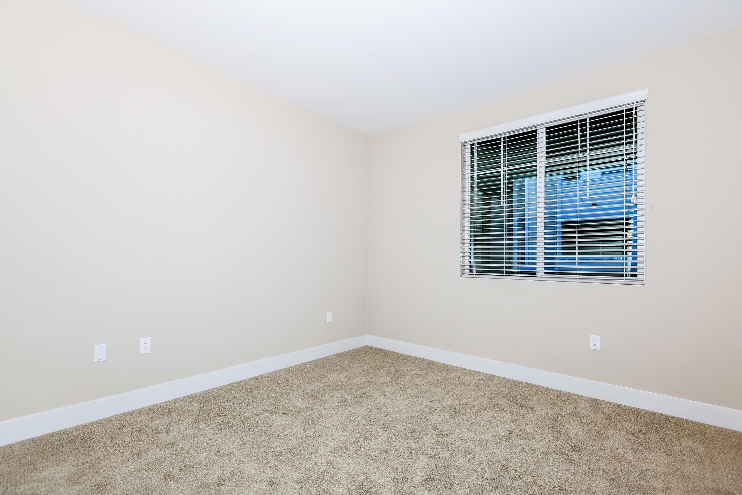 a room with a sink and a window