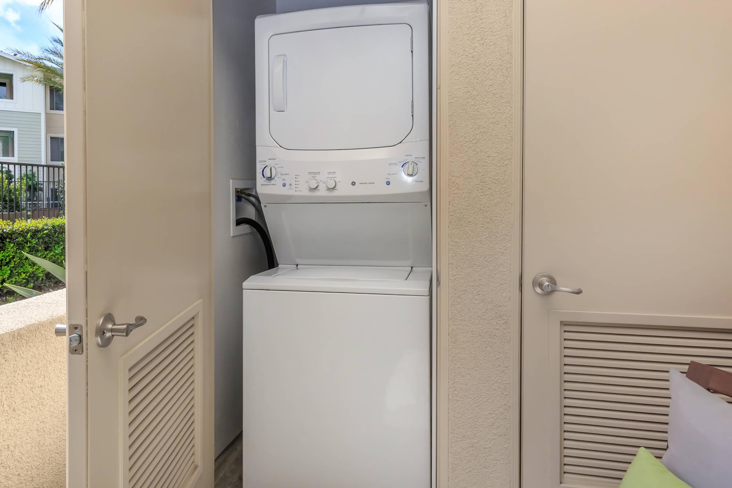 a refrigerator in a small room