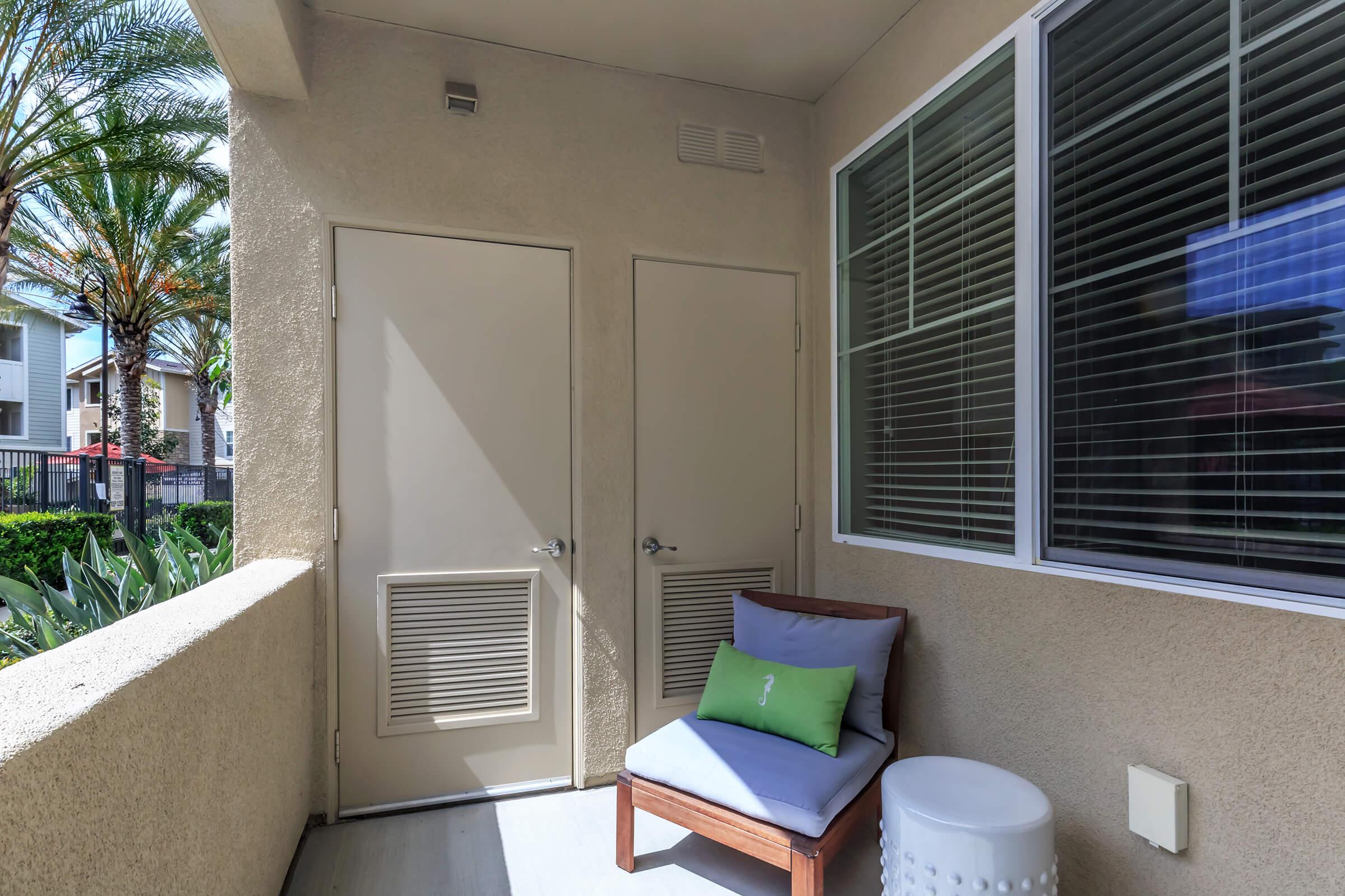 a room filled with furniture and a large window