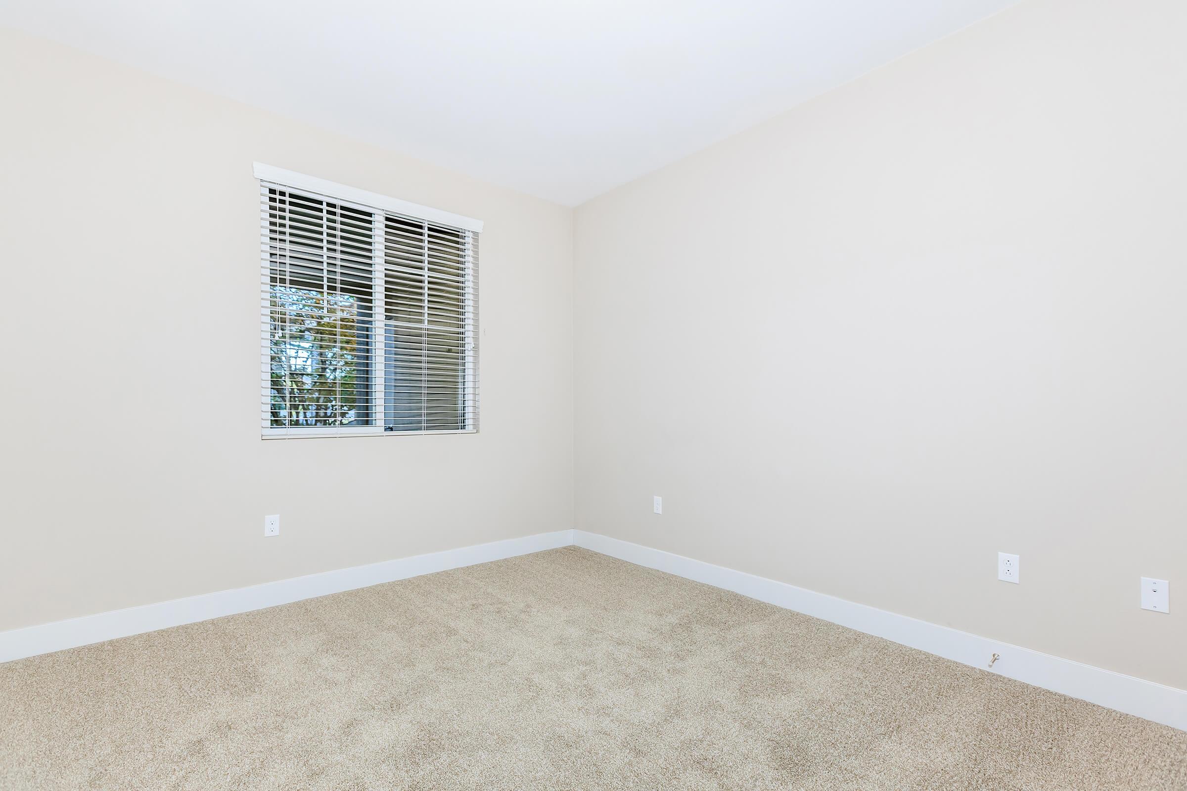 a room with a sink and a window