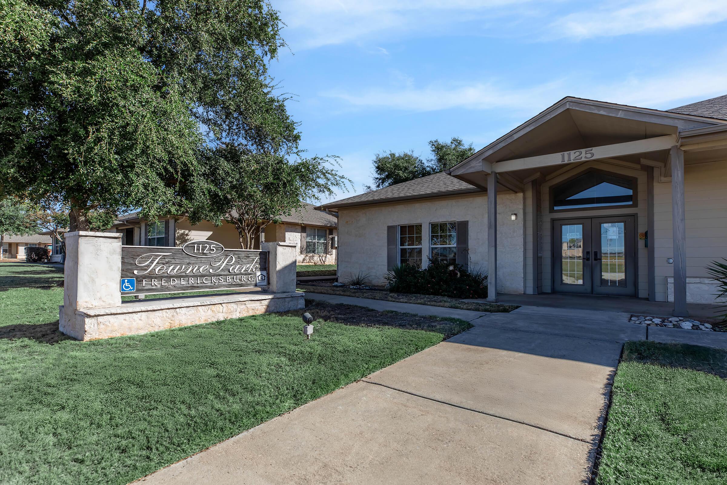 a large lawn in front of a house