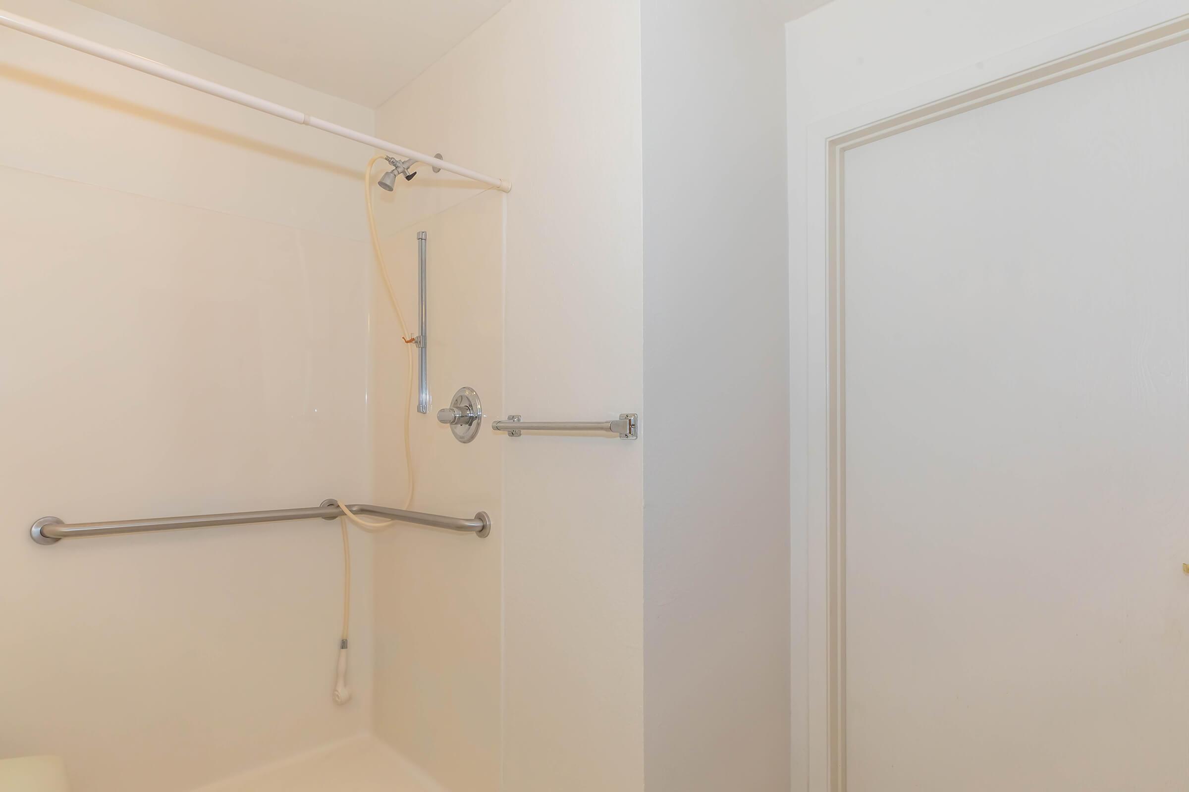 a close up of a shower in a small room