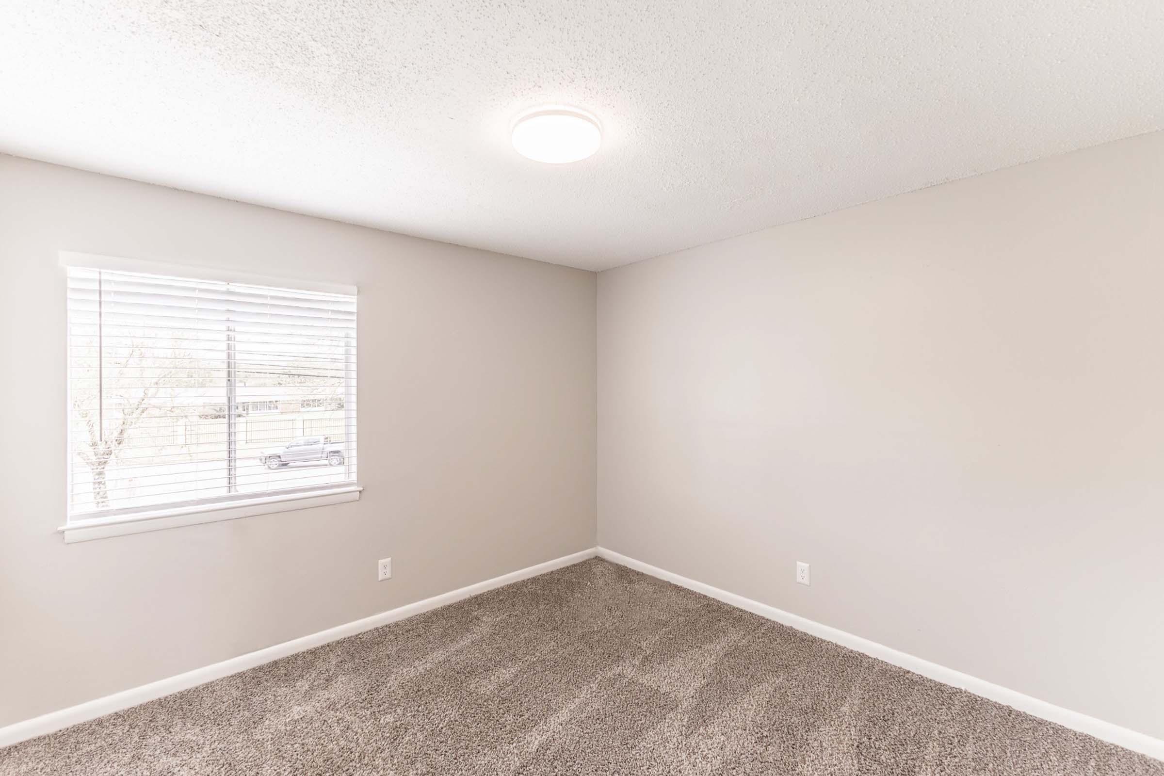 a room with a sink and a window