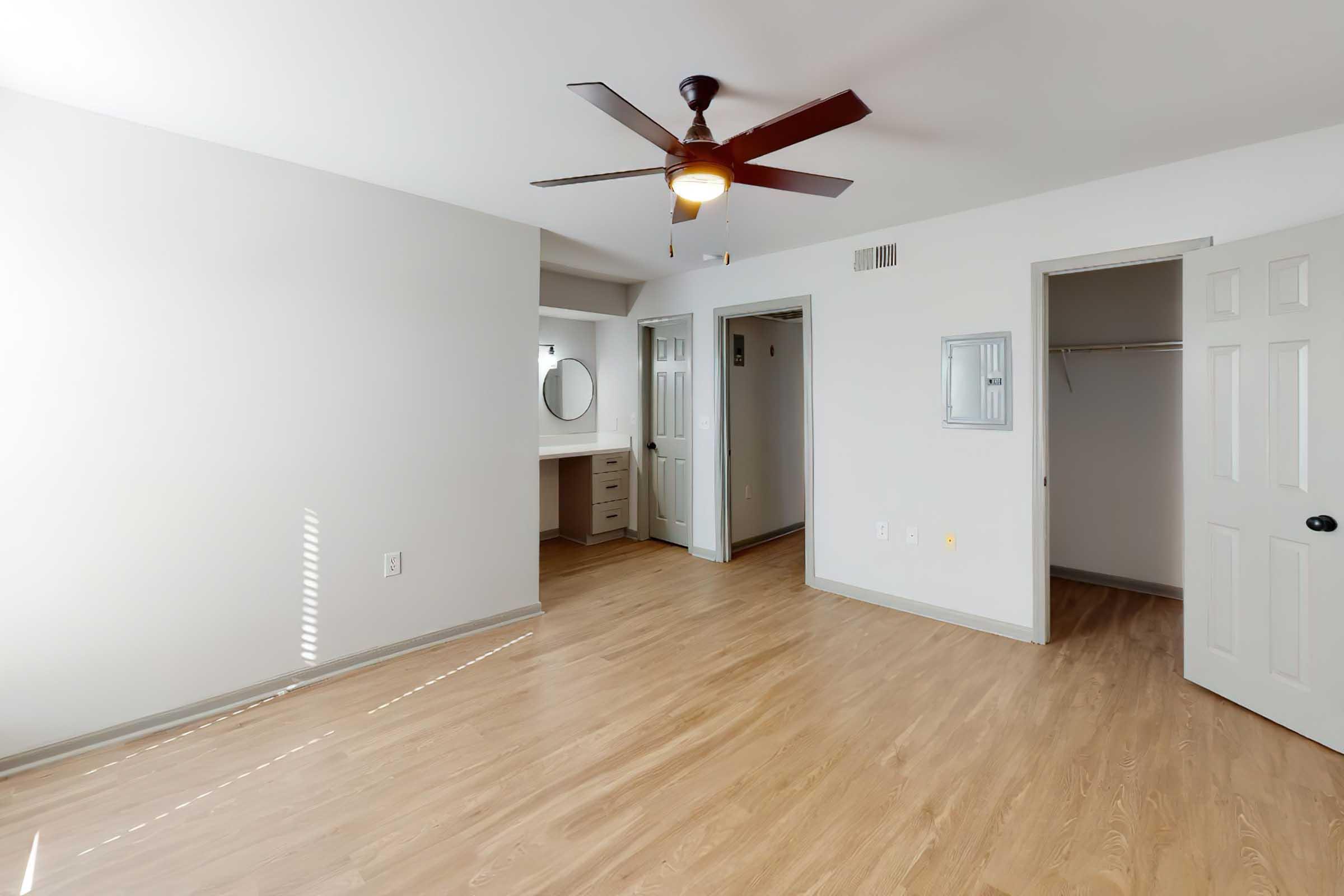 a kitchen with a wood floor