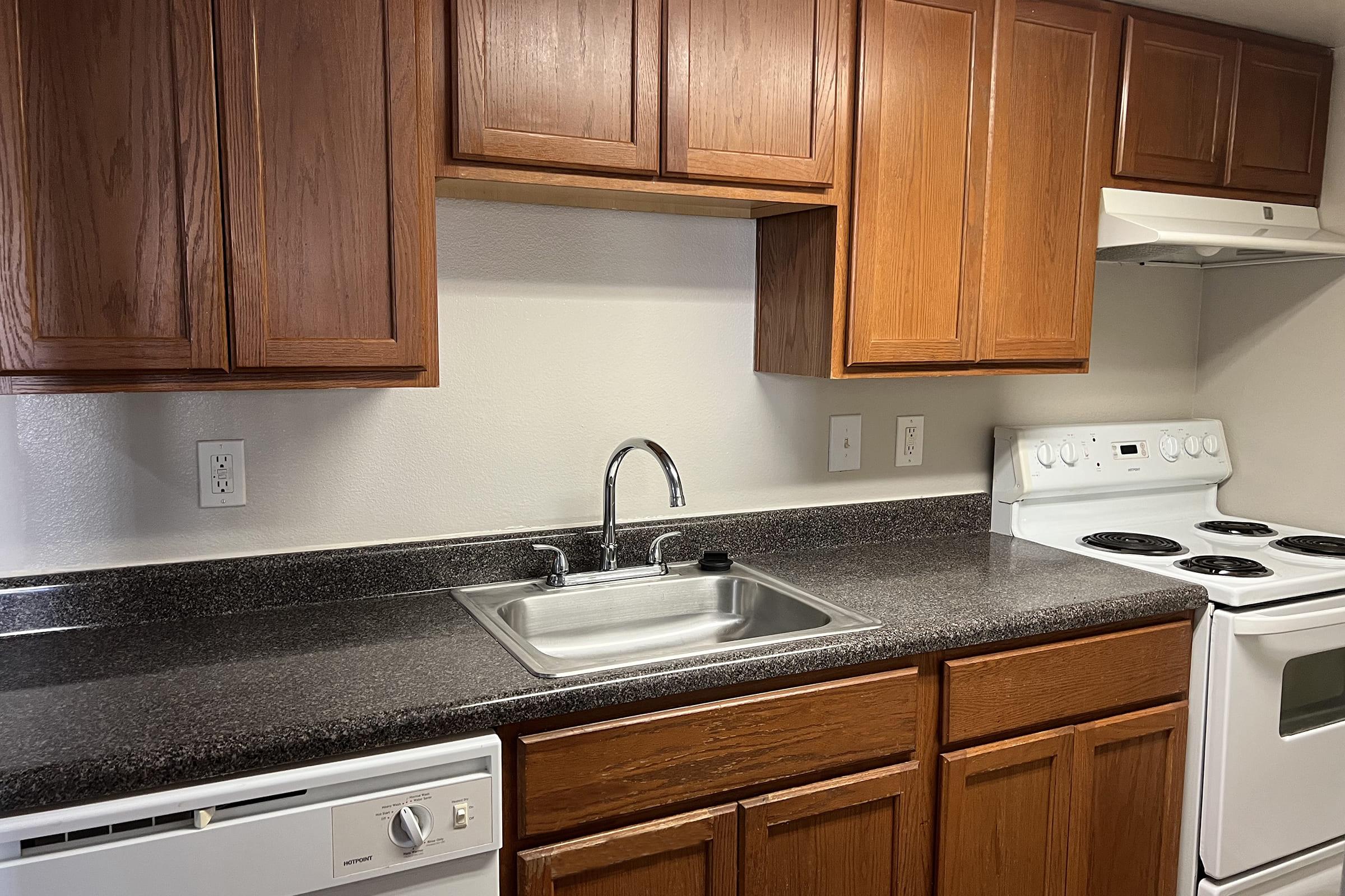 a modern kitchen with stainless steel appliances