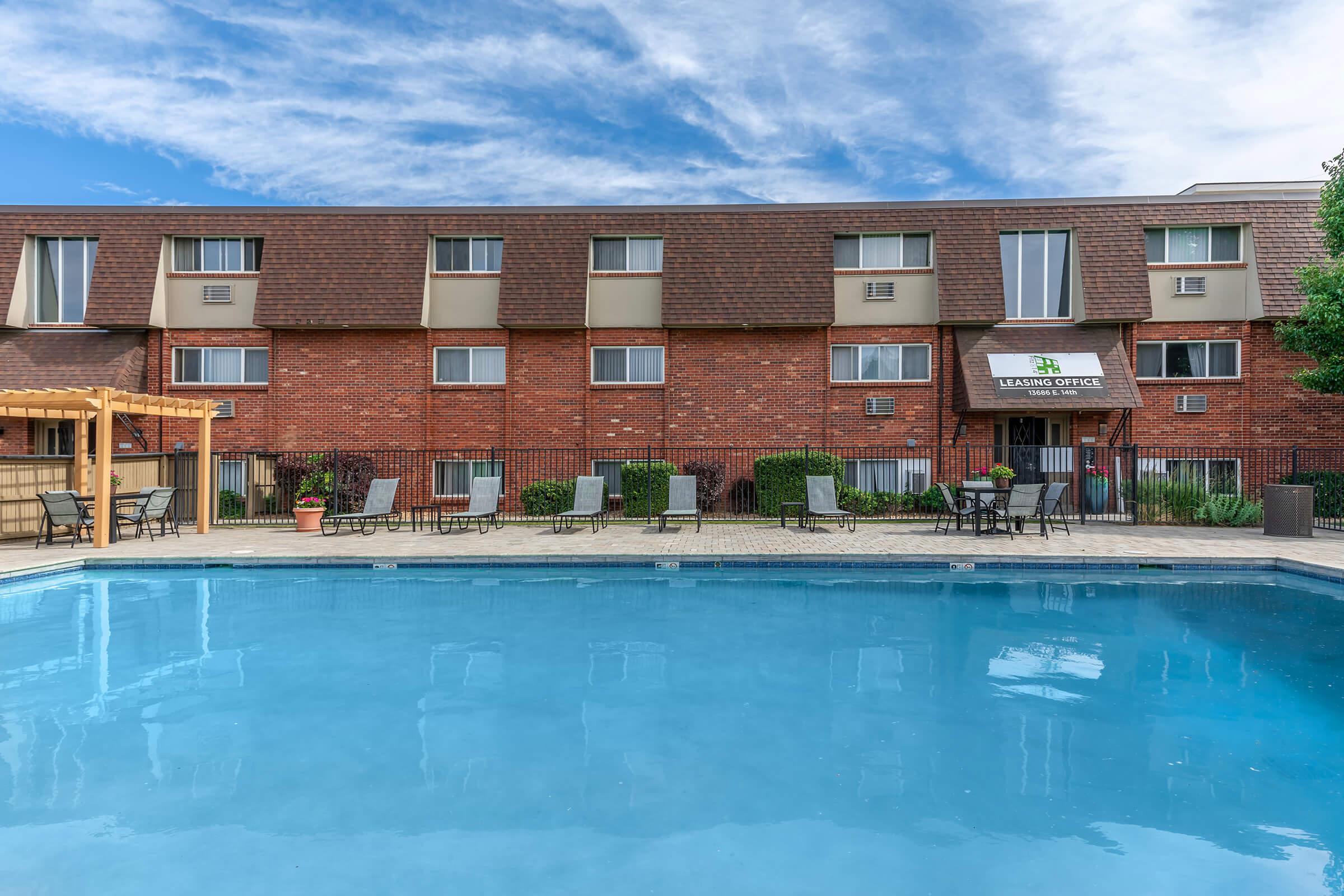 a large pool of water in front of a building