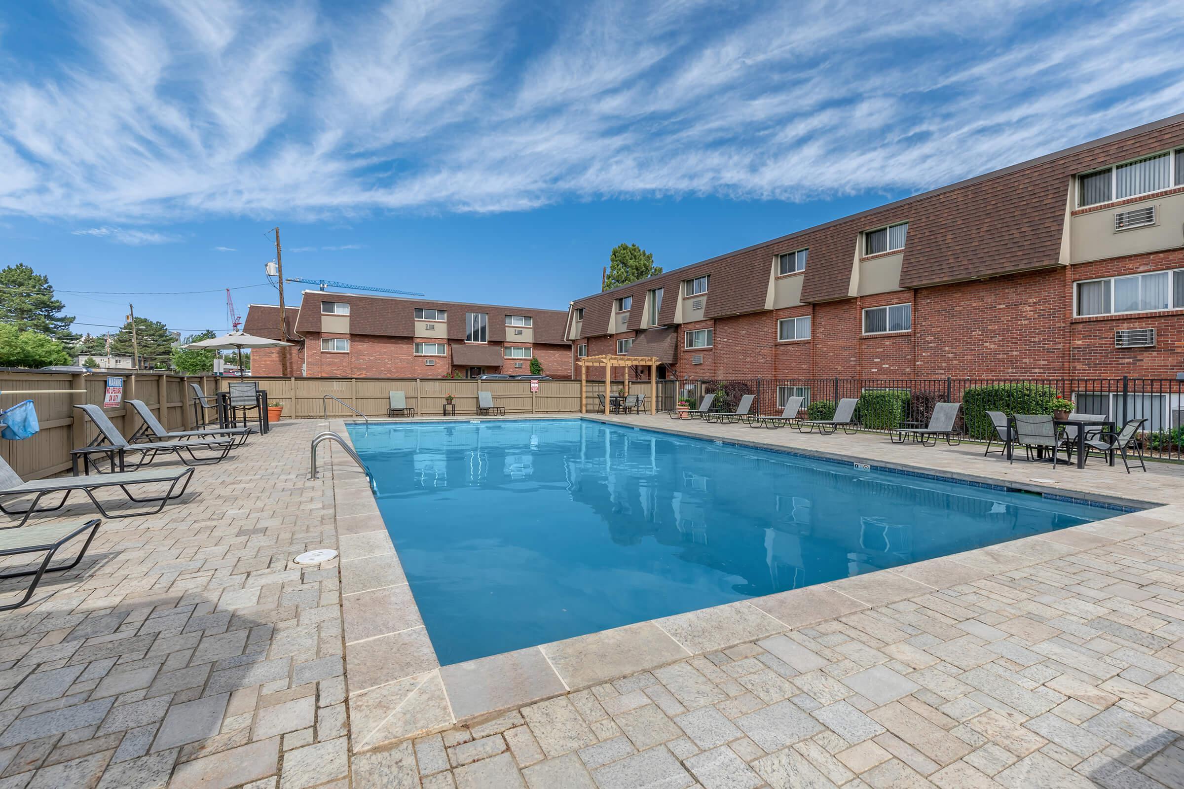 a pool next to a building