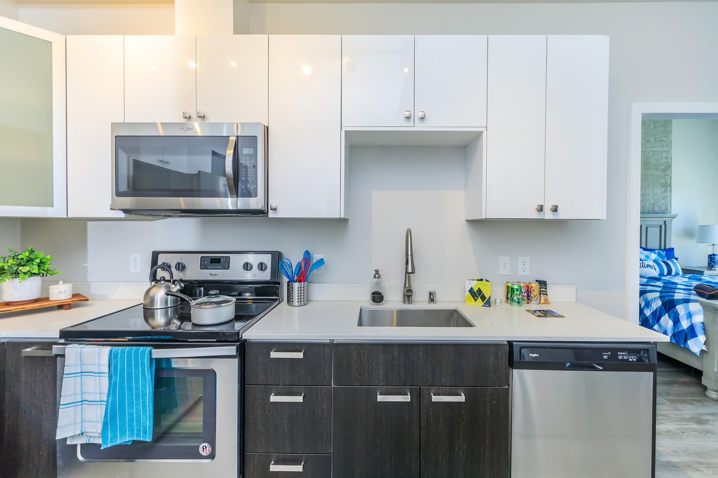 a modern kitchen with stainless steel appliances