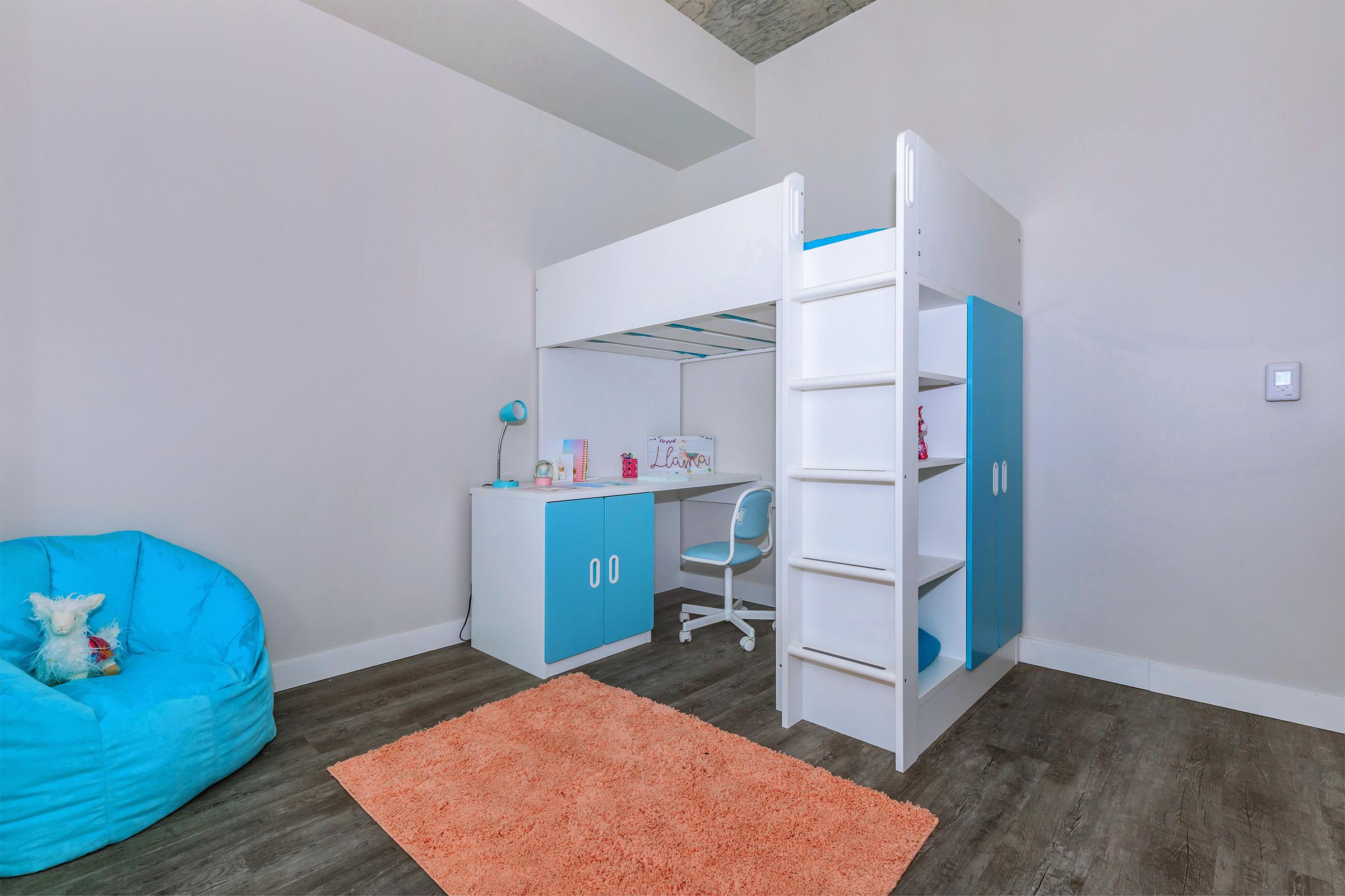 a refrigerator freezer sitting in a room