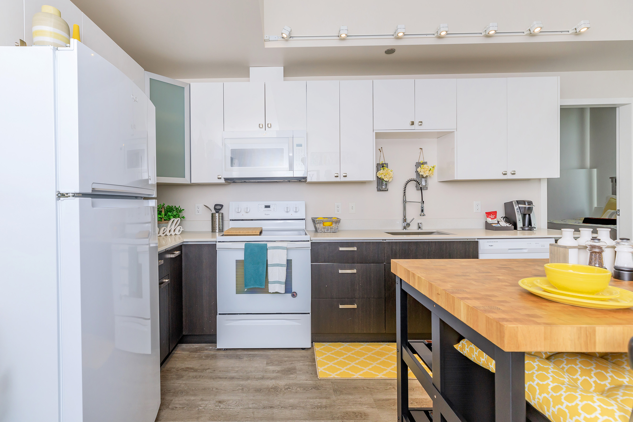 a kitchen with a stove and a refrigerator