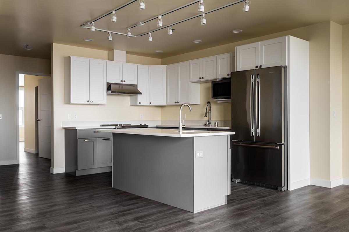 a kitchen with a wood floor