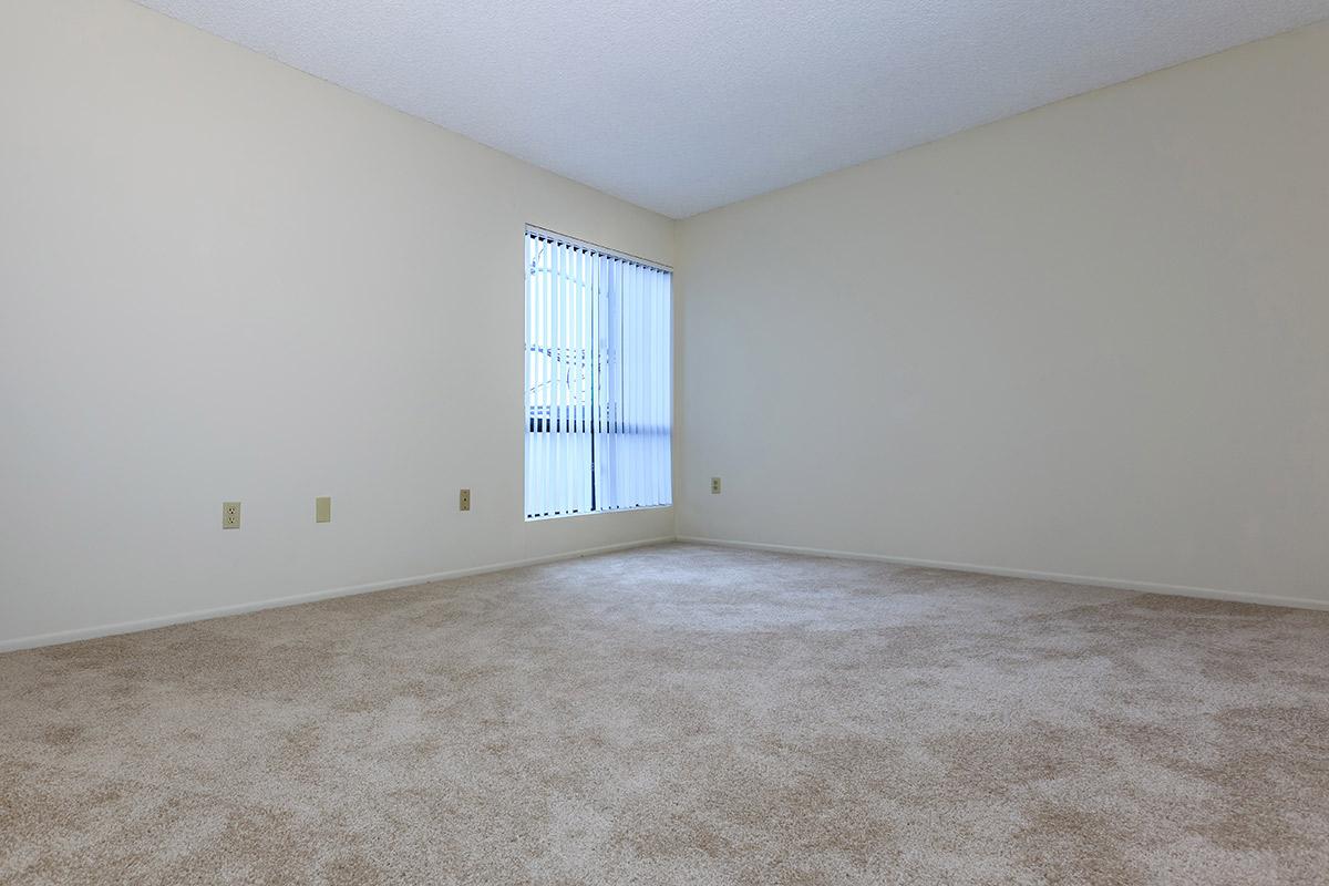 Unfurnished bedroom with carpet