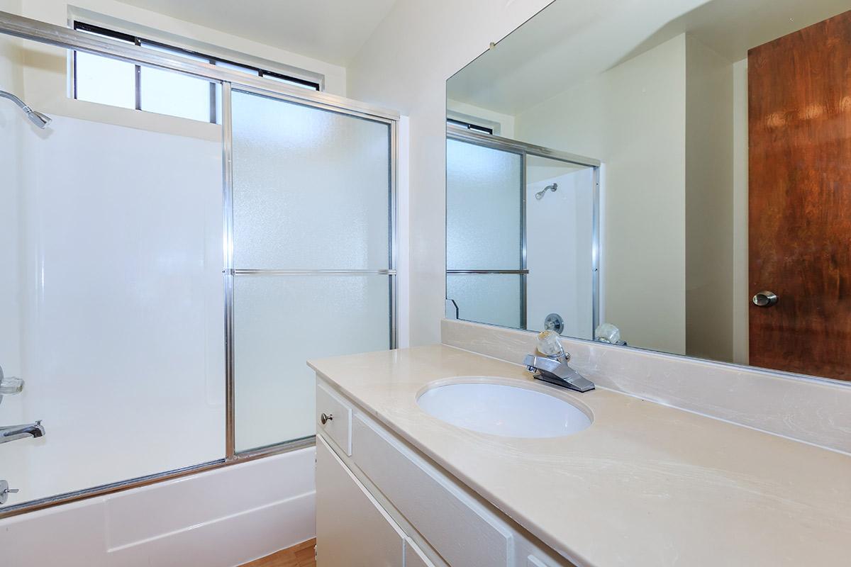 Unfurnished bathroom with glass shower doors