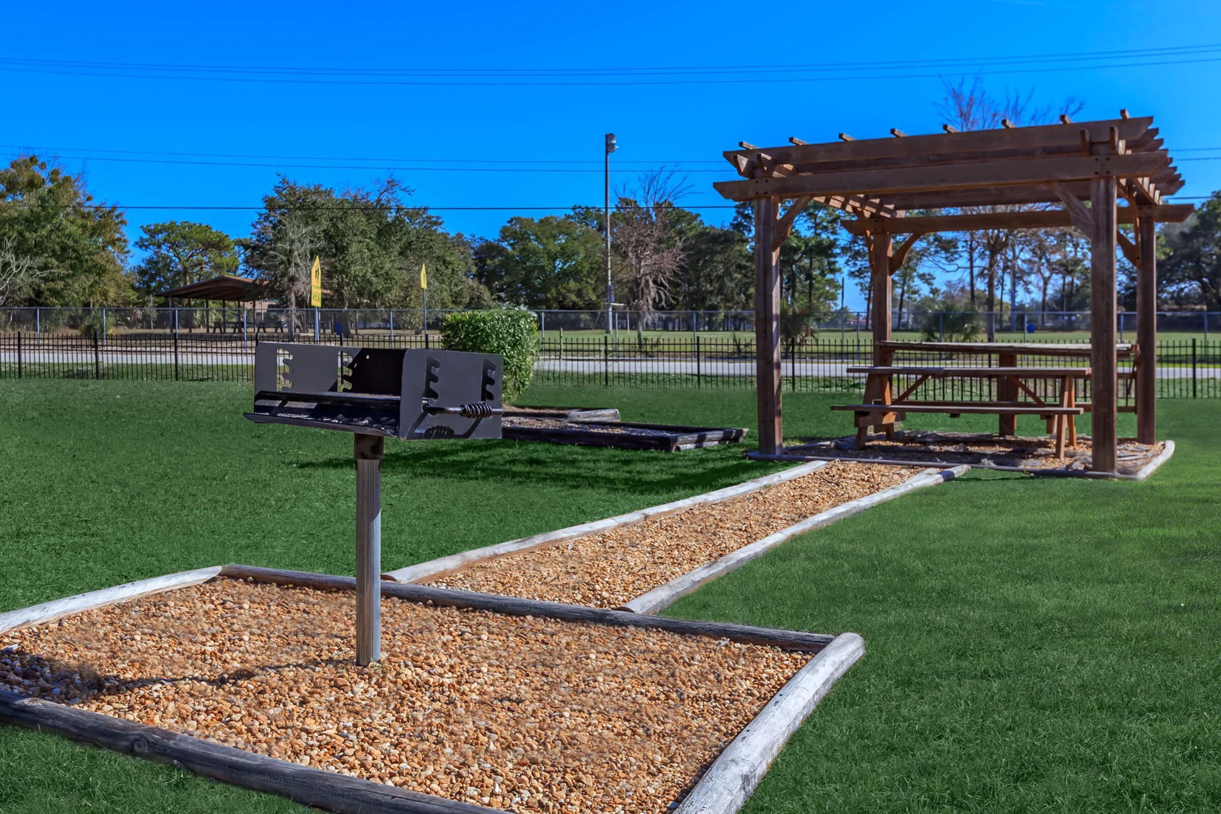 LUSH GREEN MANICURED PICNIC AREA WITH BARBECUE