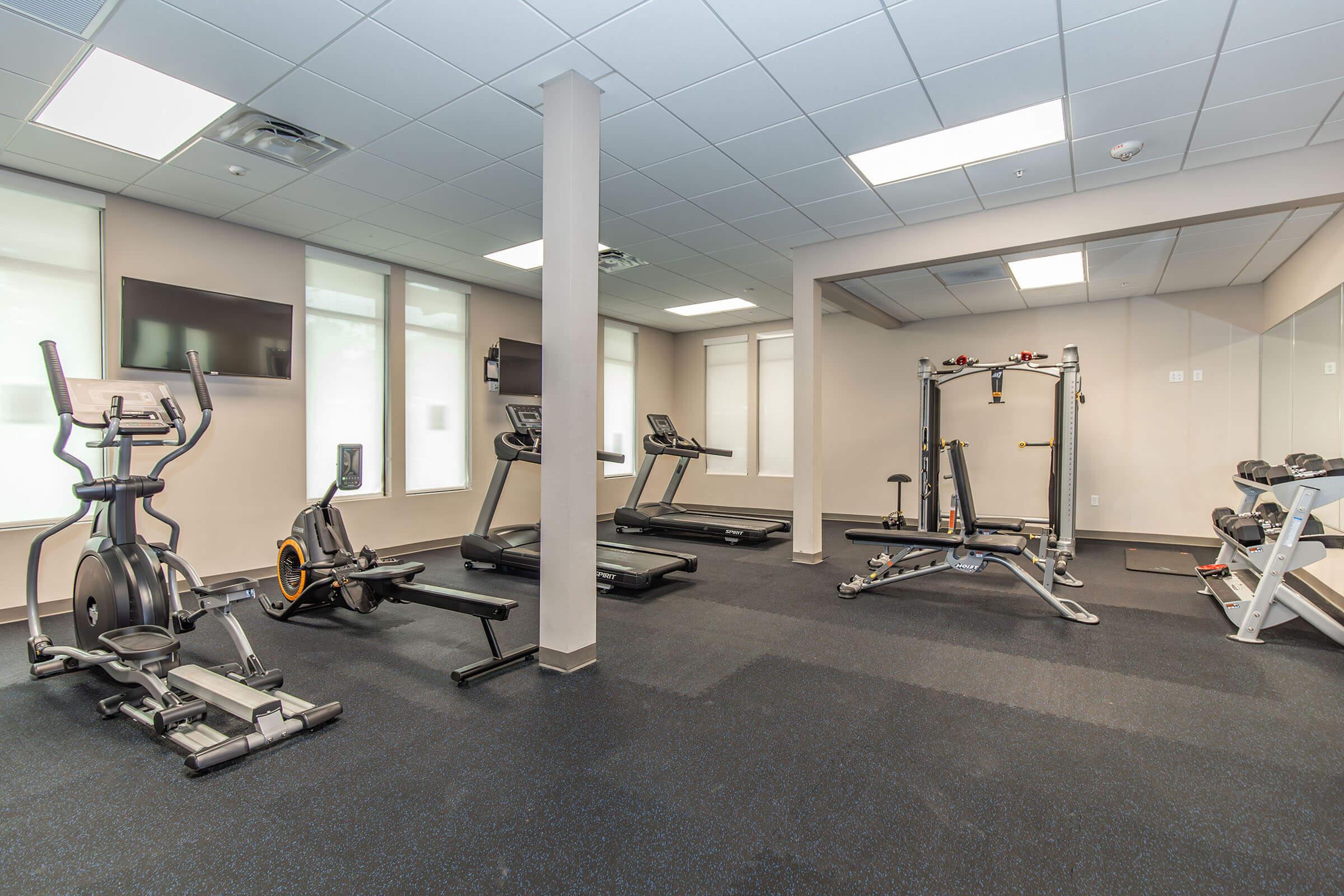 a room filled with furniture and a large building