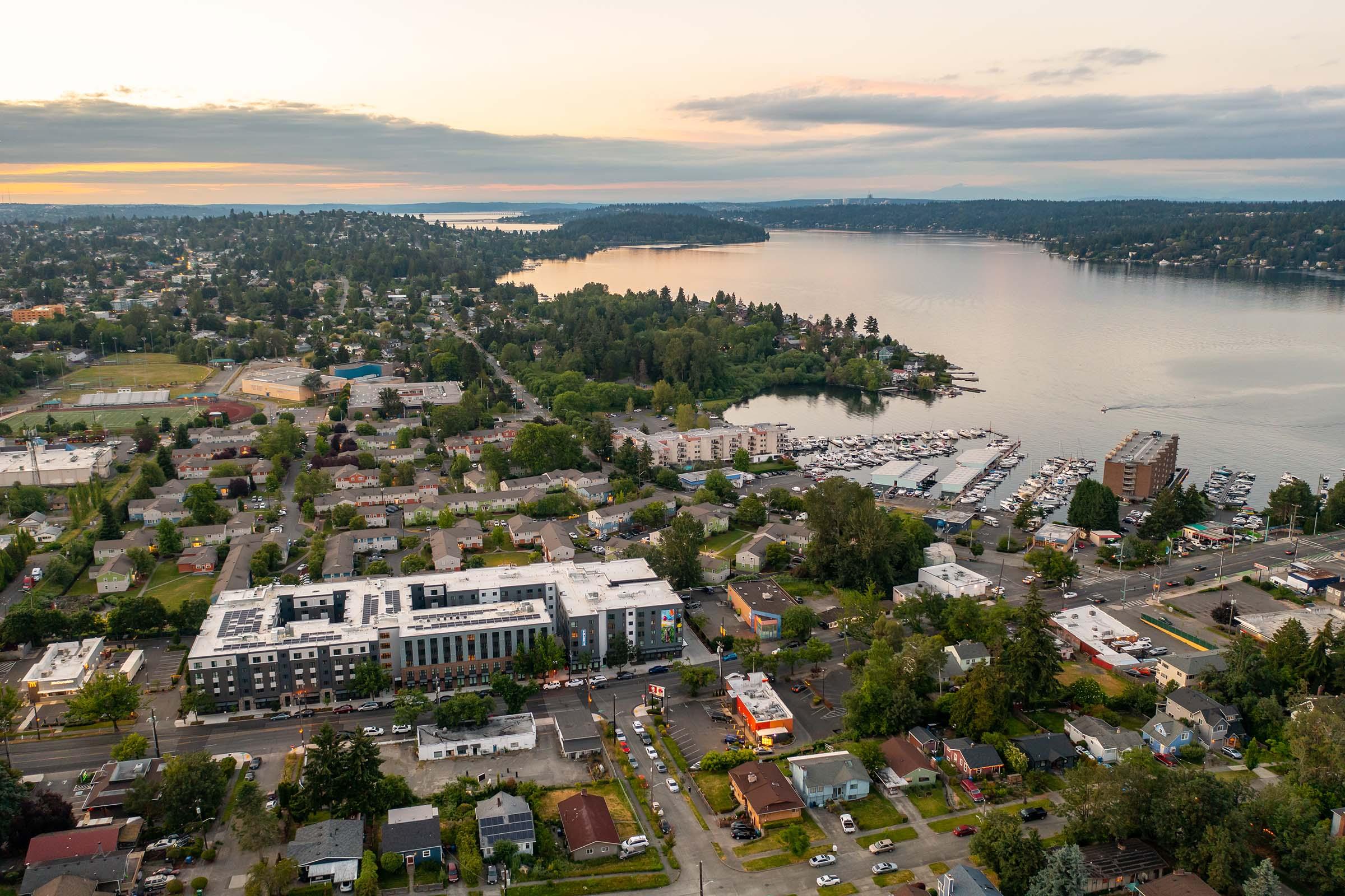 a large body of water with a city in the background