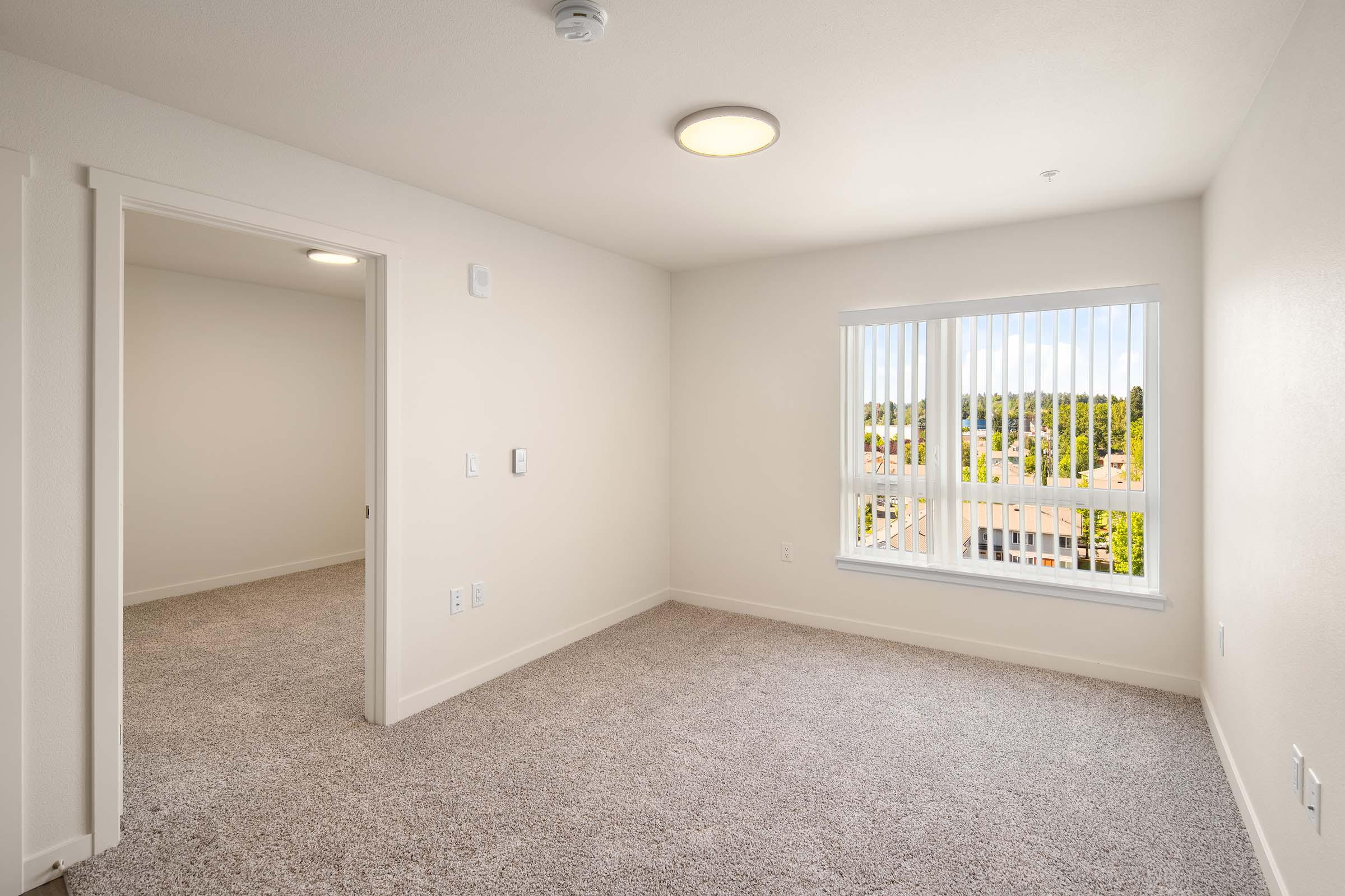 a room with a sink and a window