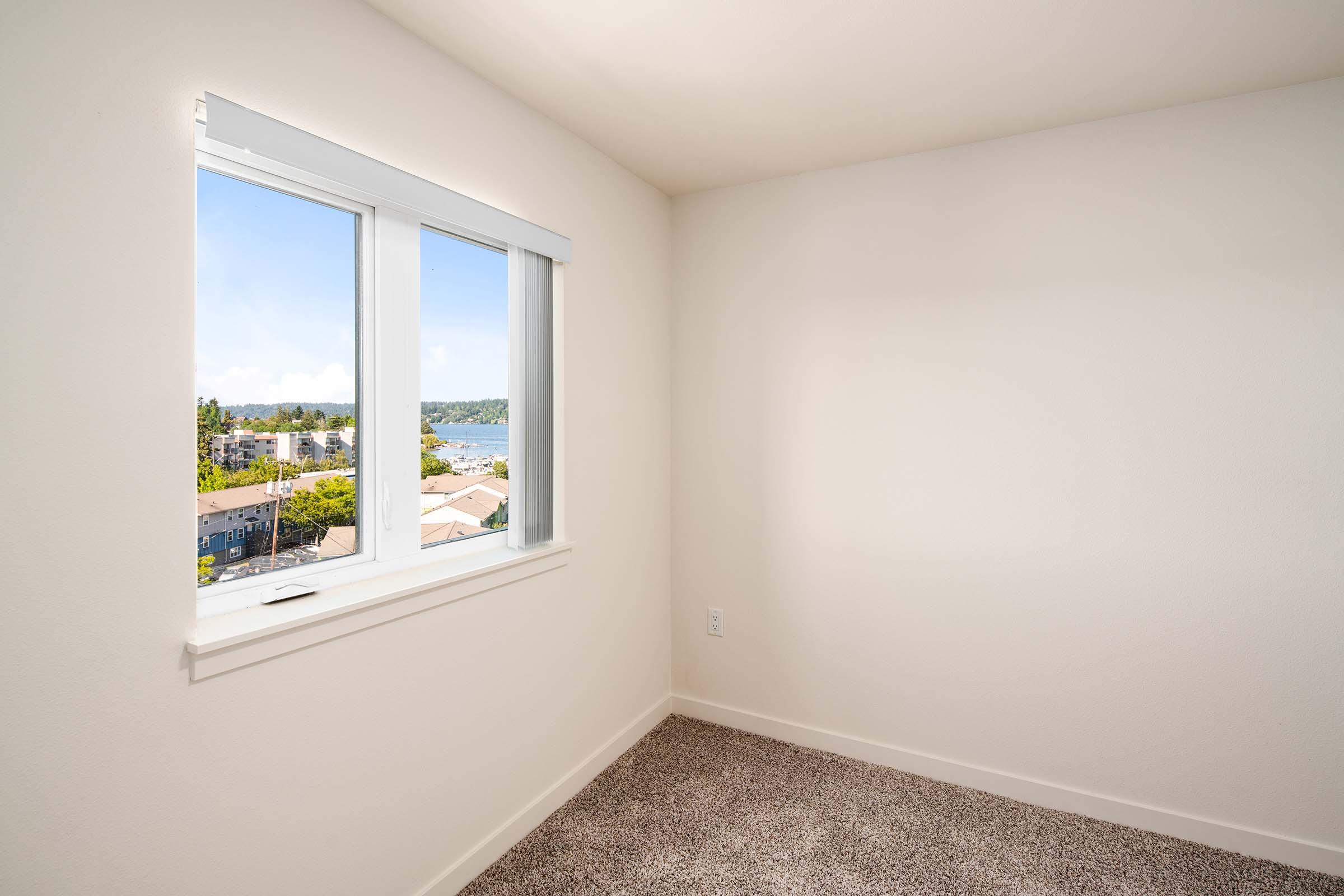 a room with a sink and a window