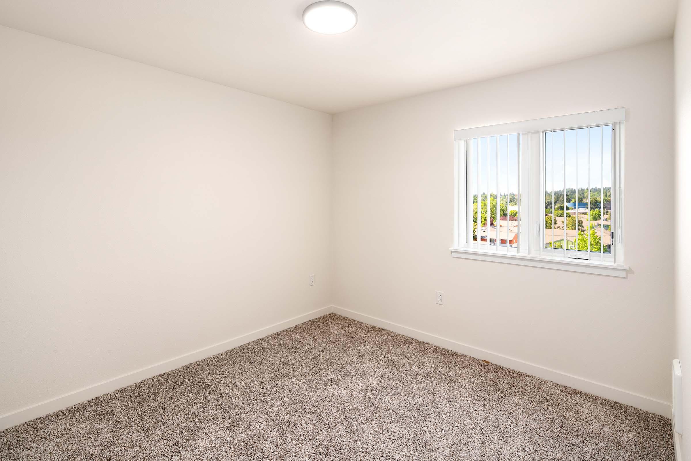 a room with a sink and a window